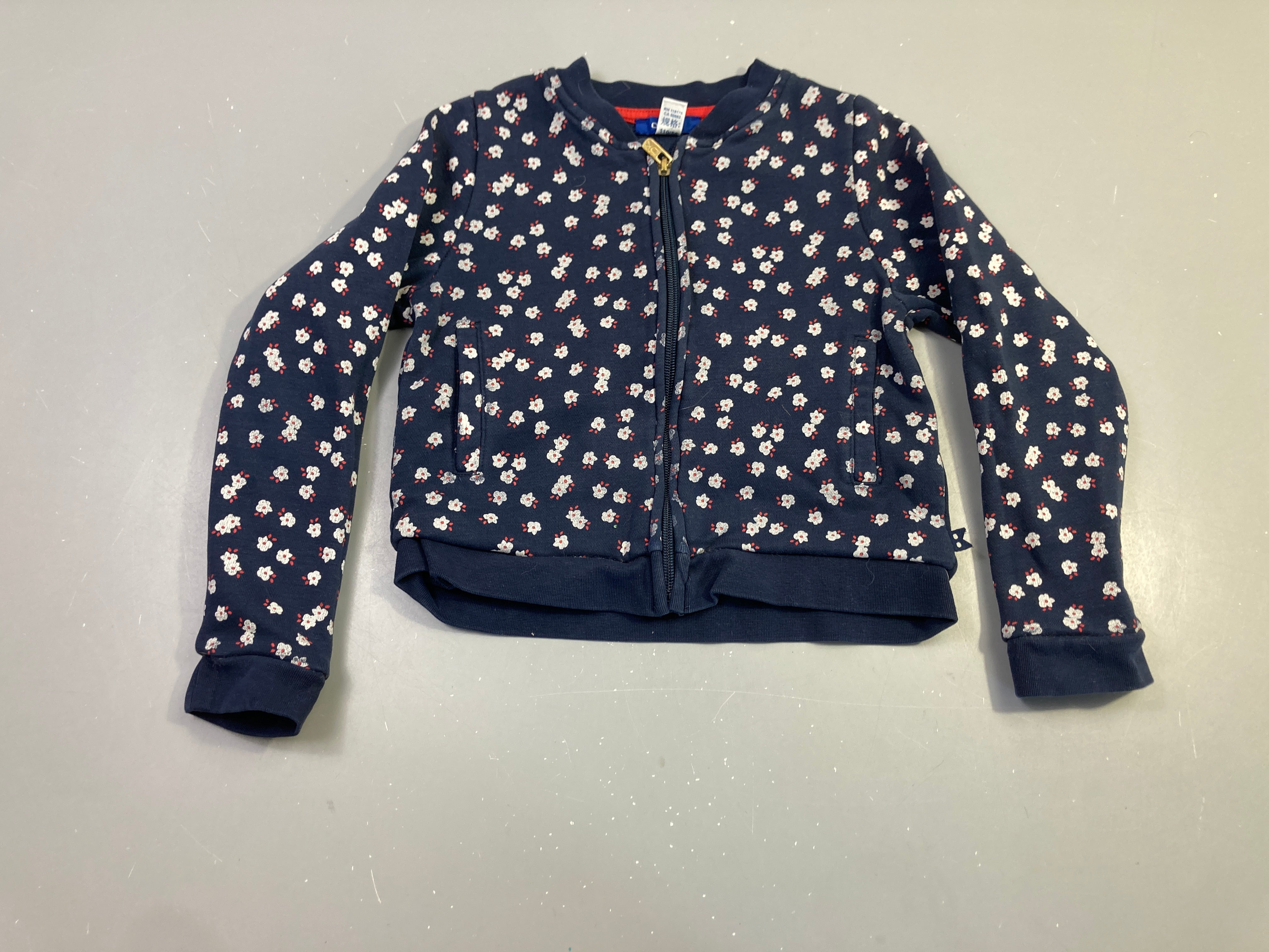 Sweat zippé bleu marine fleuri