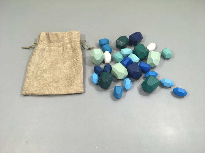 Jeu d'équilibre en bois cailloux à empiler bleu/vert, moins cher chez Petit Kiwi