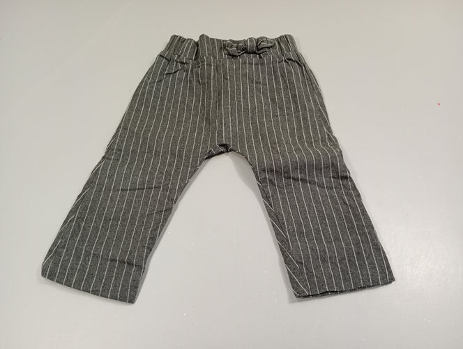 Pantalon gris chiné ligné blanc , petit noeud sur le côté, moins cher chez Petit Kiwi
