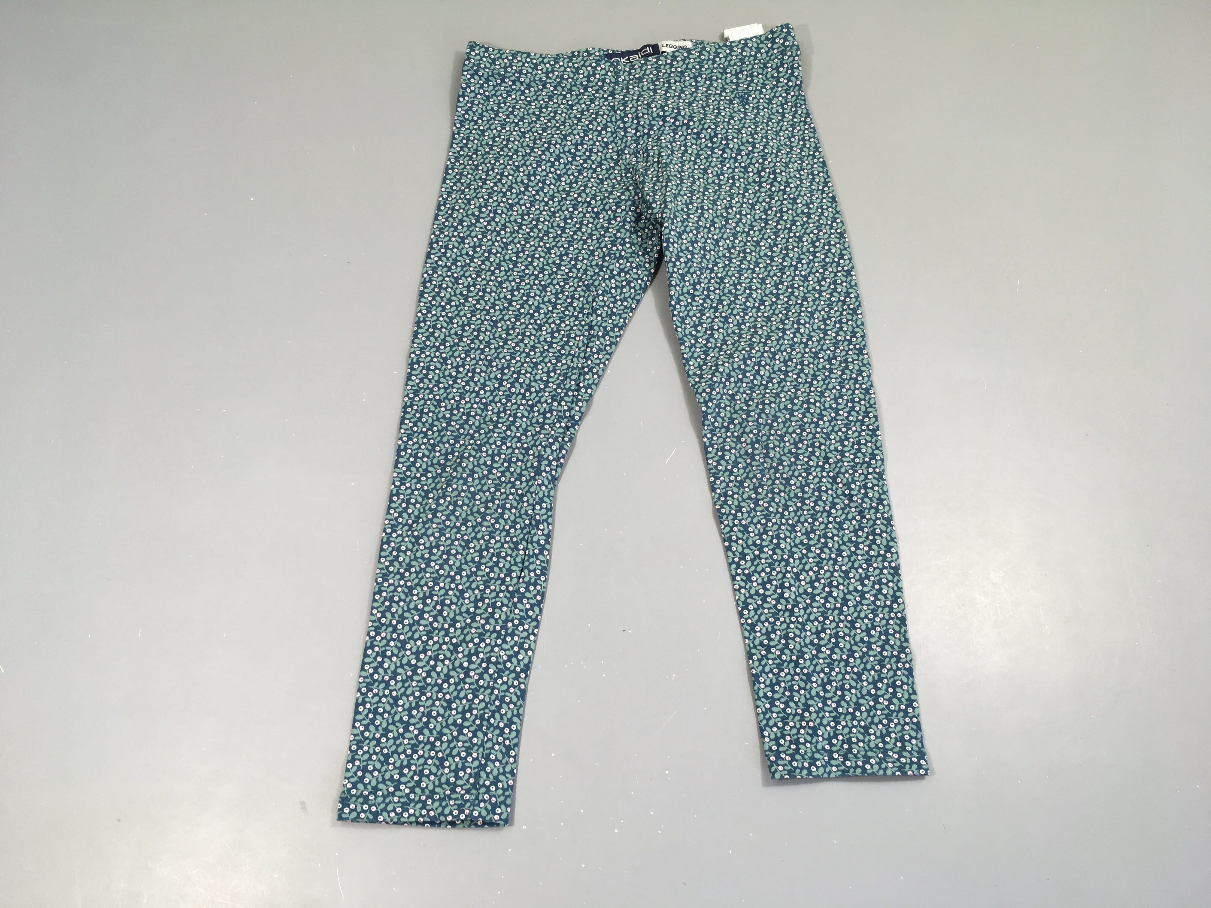 Legging vert motifs feuillage baies crèmes