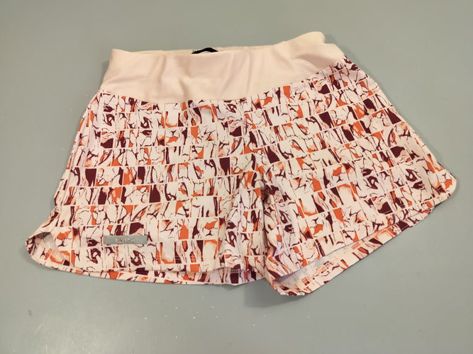 Short de sport  rose pâle à motifs imprimés. Pas de taille indiquée, estimée 11a, moins cher chez Petit Kiwi