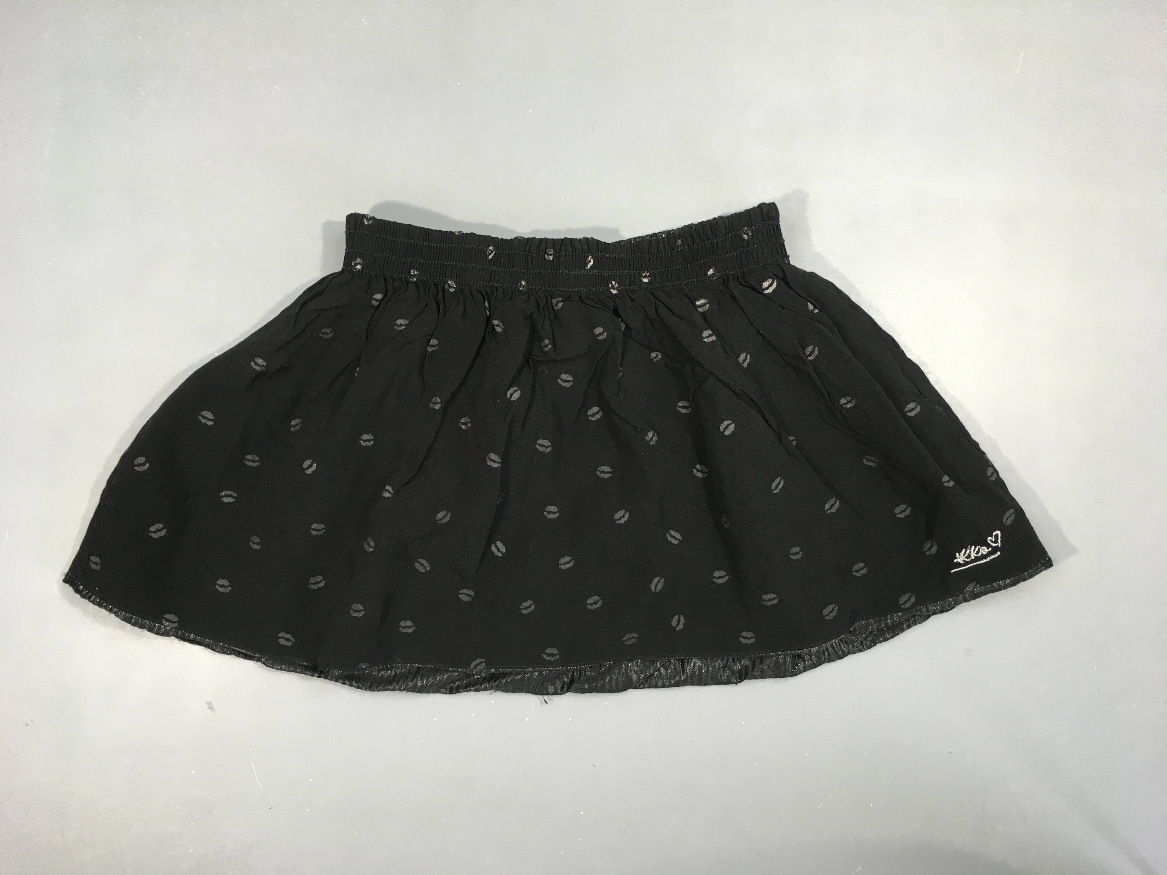 Jupe réversible noire texturée irisée/noir bouches argentées