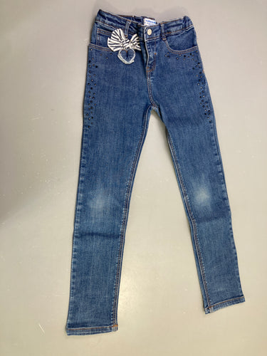 Jean skinny bleu nœud strass, moins cher chez Petit Kiwi