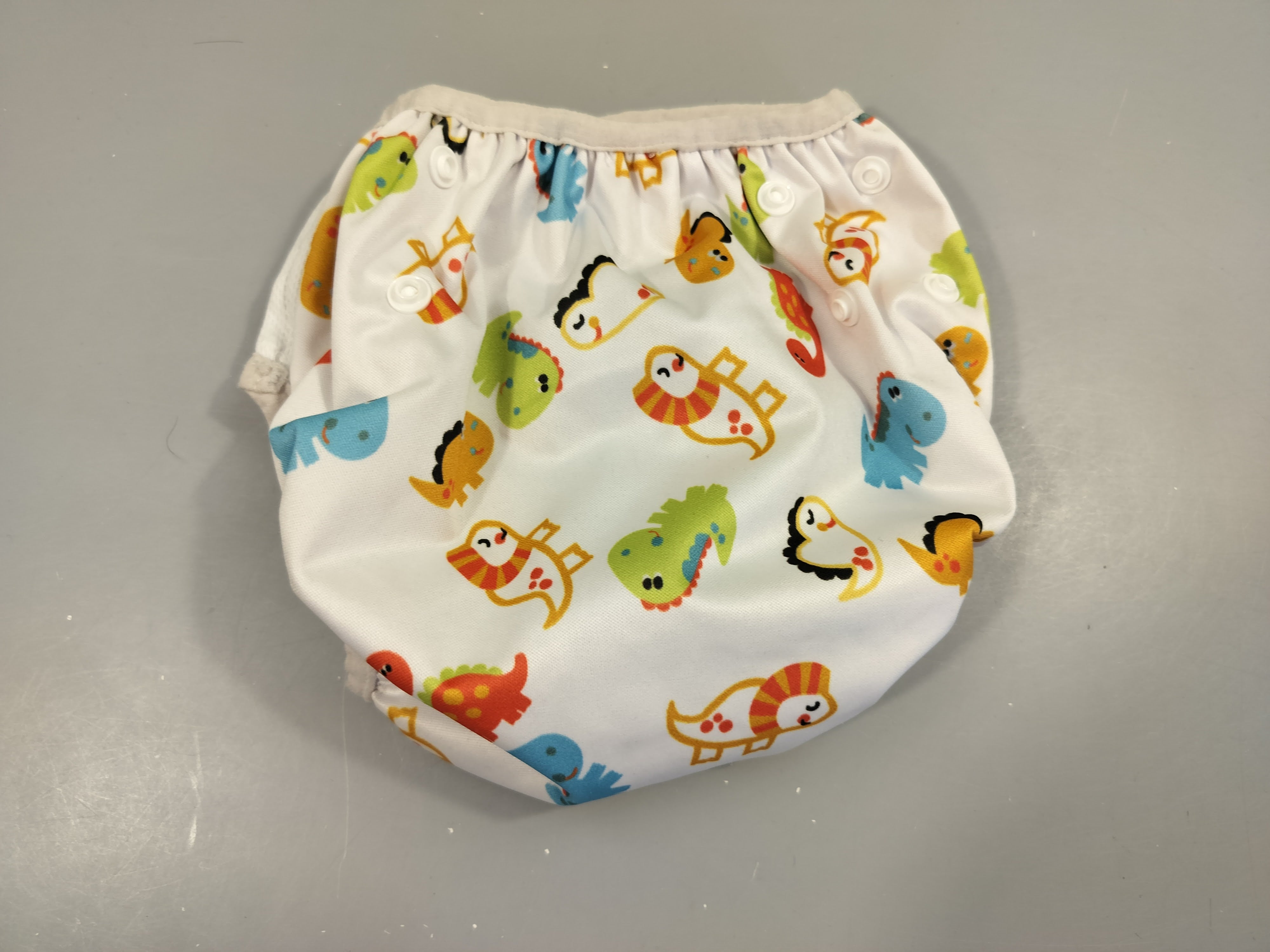 B'bies Culotte de prote.ction pour couche lavable blanche motifs dinosaures