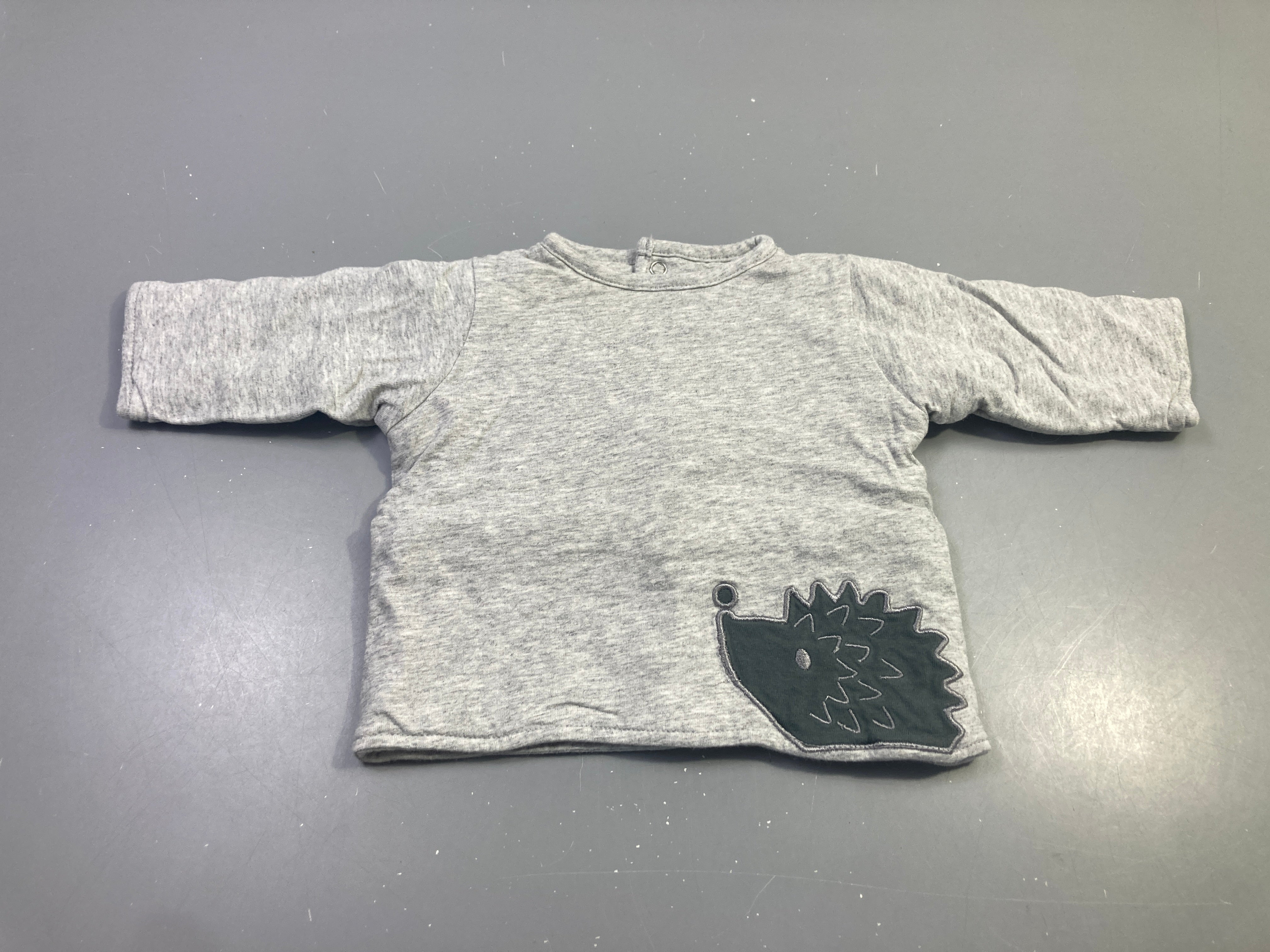 Pull ouatiné gris chiné hérisson appliqué