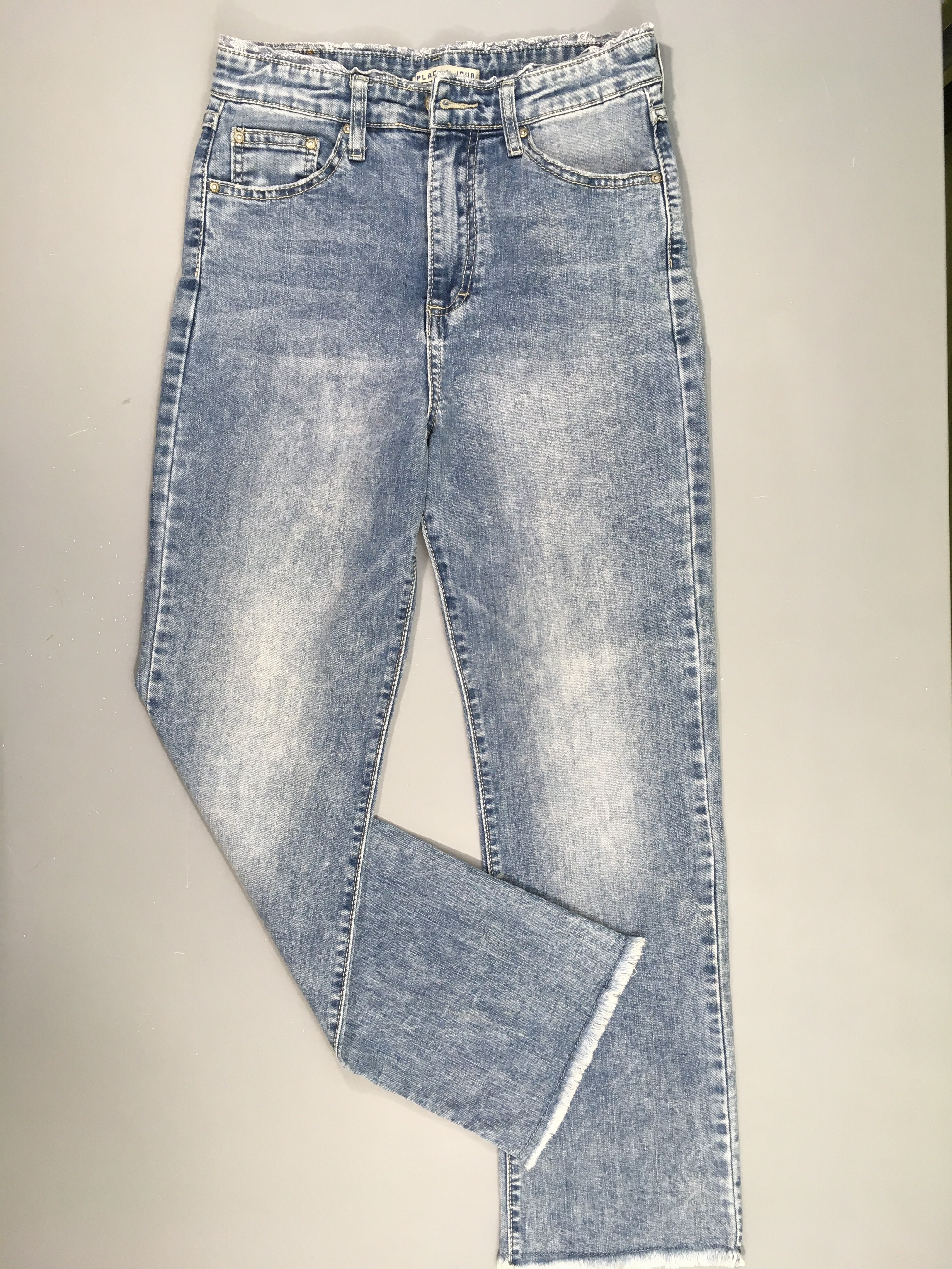 Jeans effet effiloche bas froufrou léger tailles 34