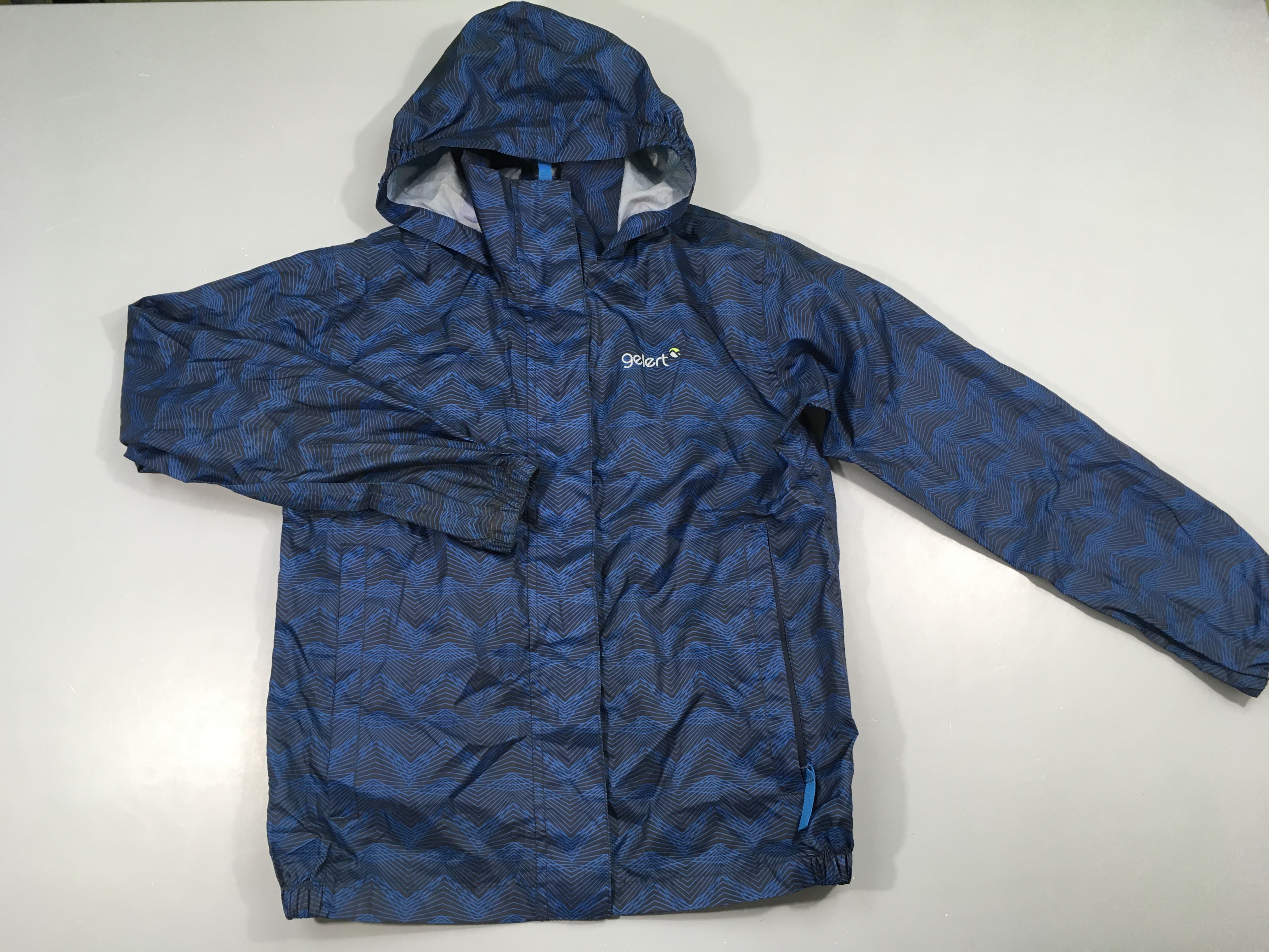 Coupe vent style k-way imperméable bleu foncé motifs géométriques Gelert