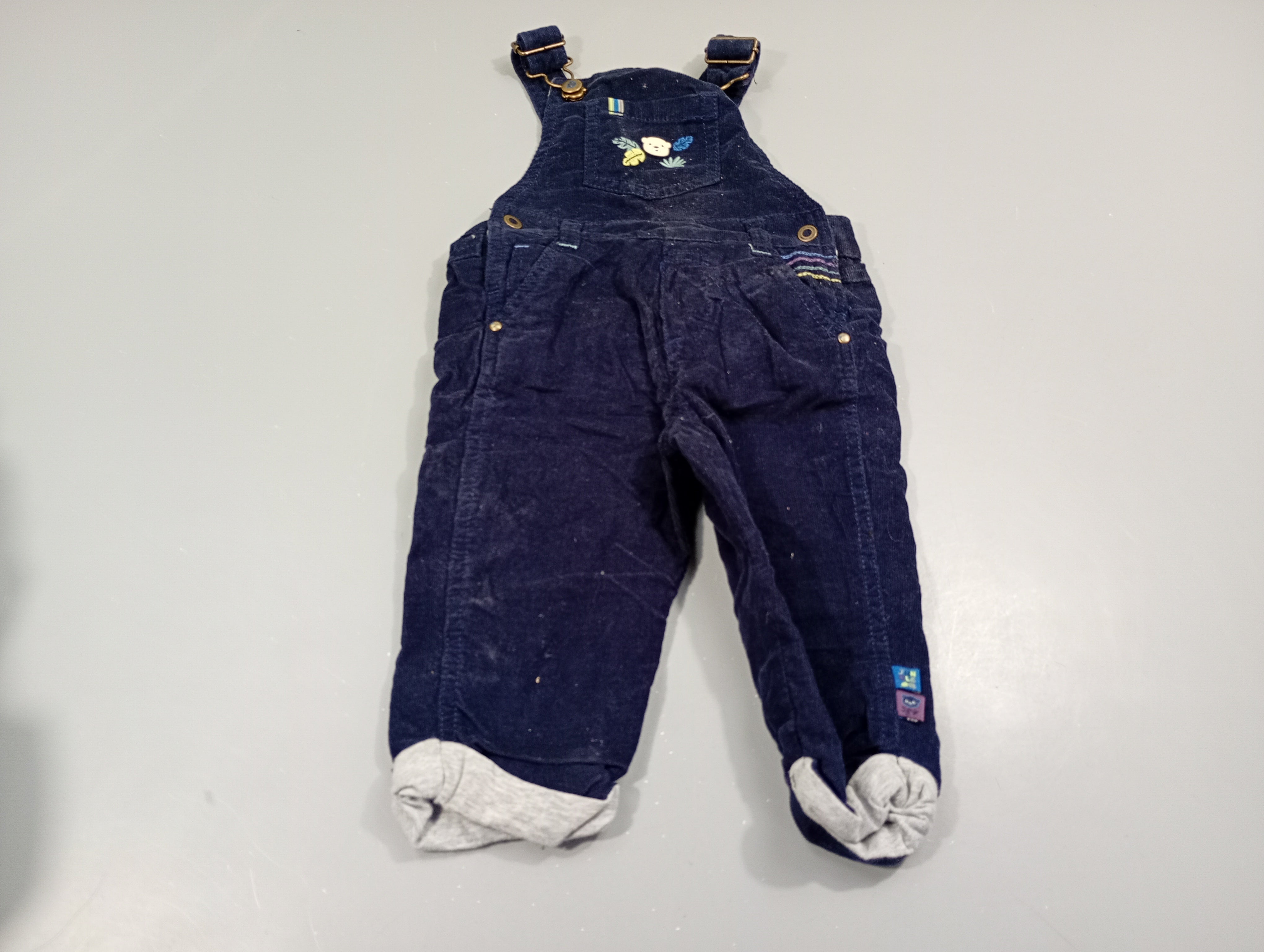 Salopette bleu marine à revers en velours côtelé , tête d'ourson