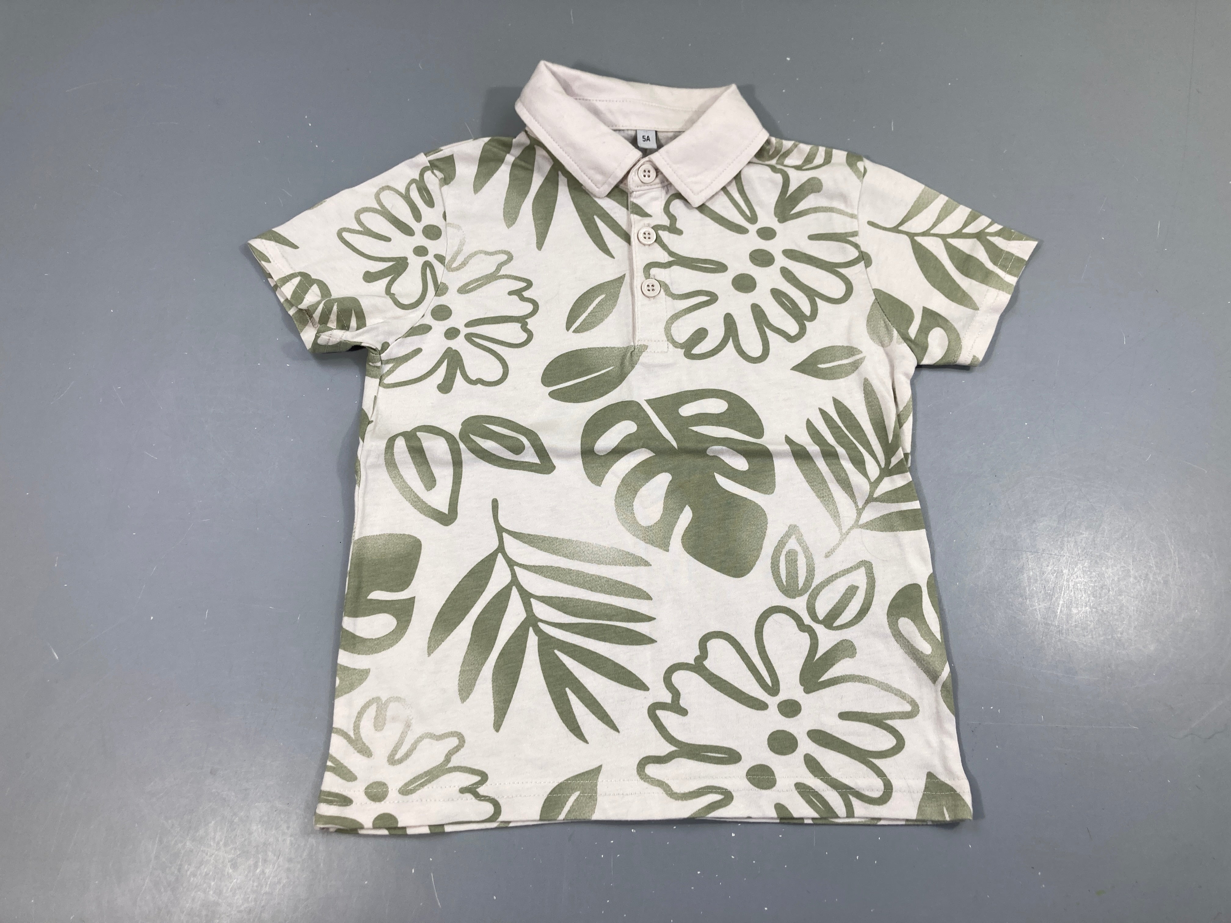 Polo m.c jersey écru feuilles