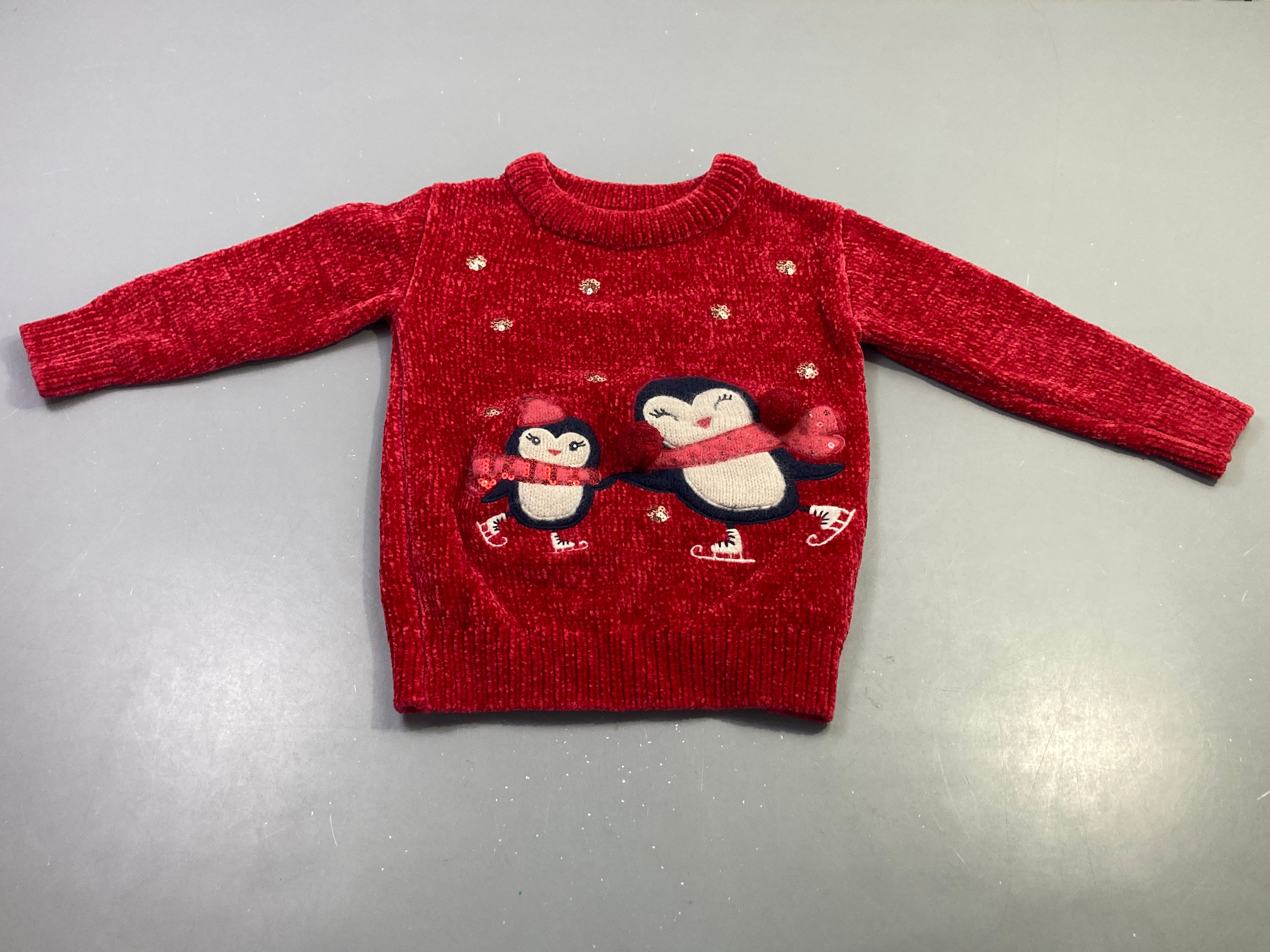 Pull rouge pingouins chenille sequins pompons