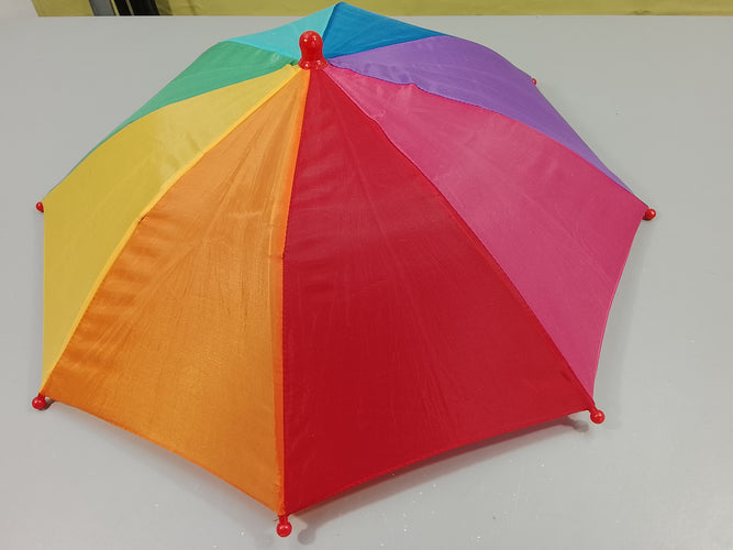 Chapeau parapluie (quelques petits trous), moins cher chez Petit Kiwi