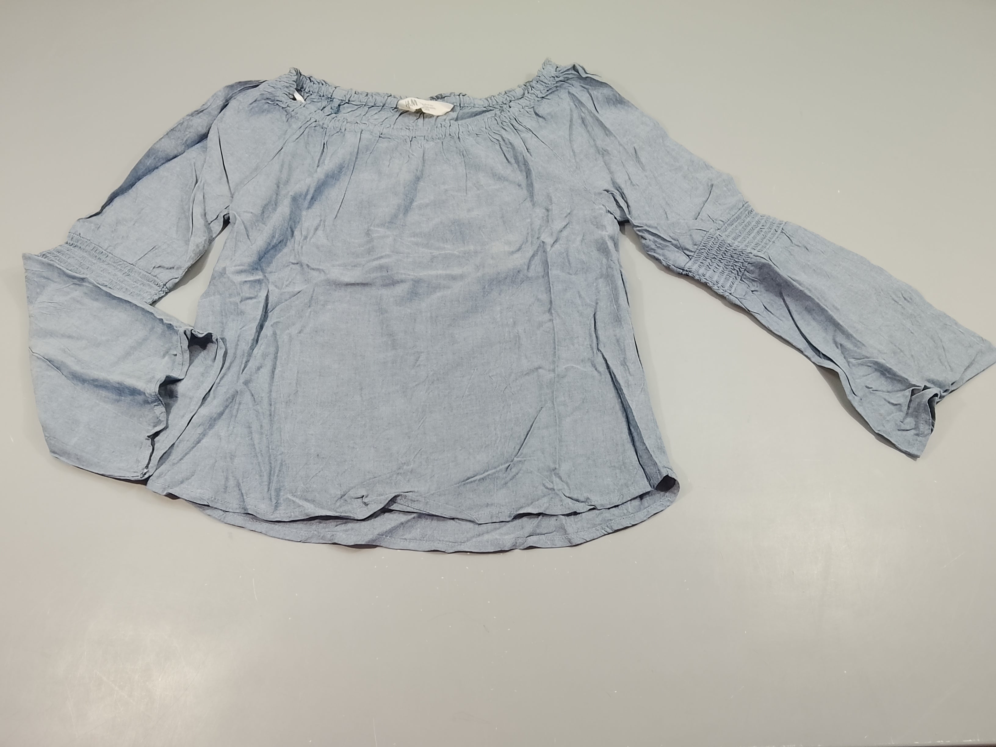Blouse ml  bleu denim, bas des manche évasé, col élastique