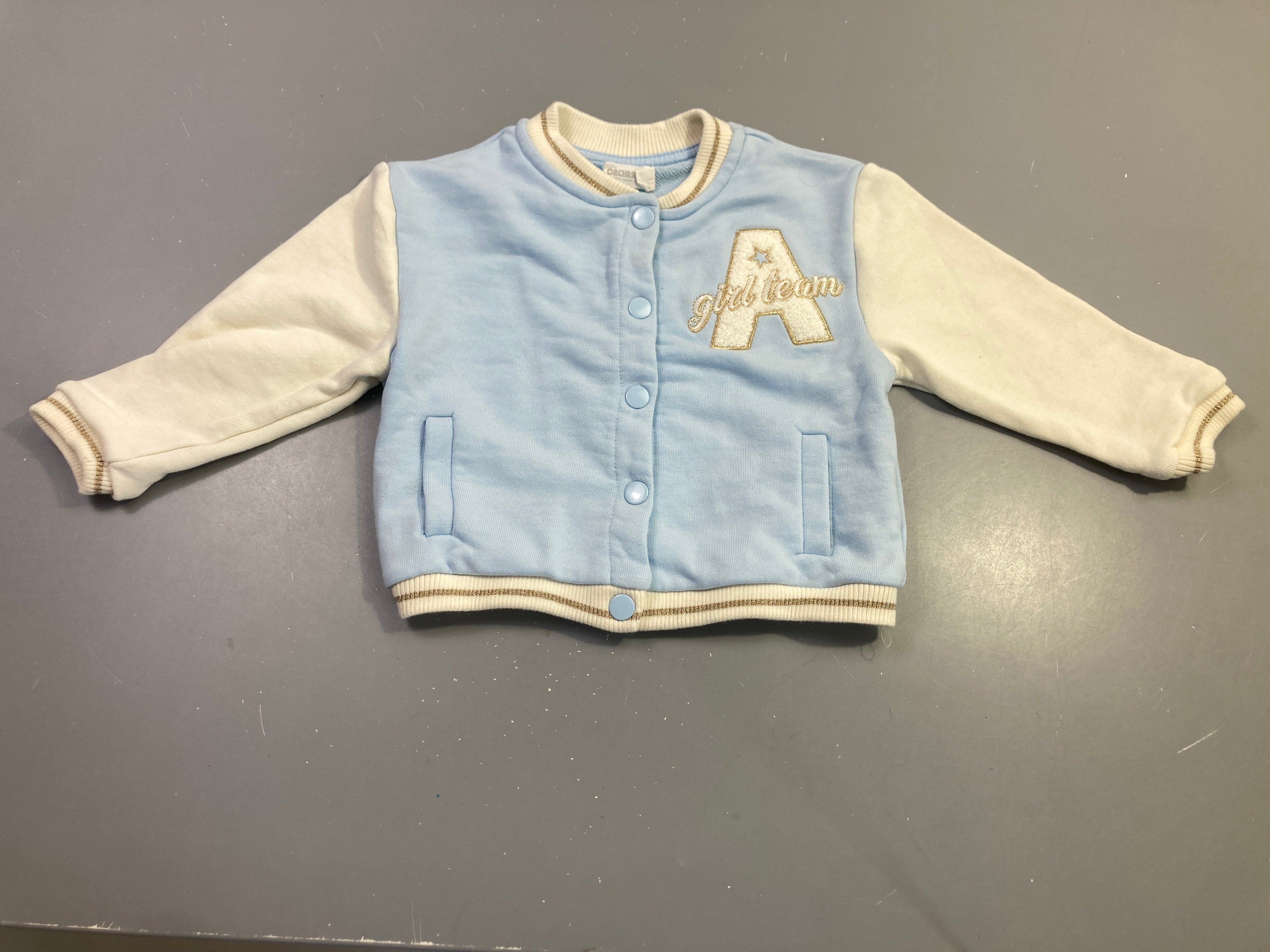 Blouson molleton bleu ciel et écru girl team