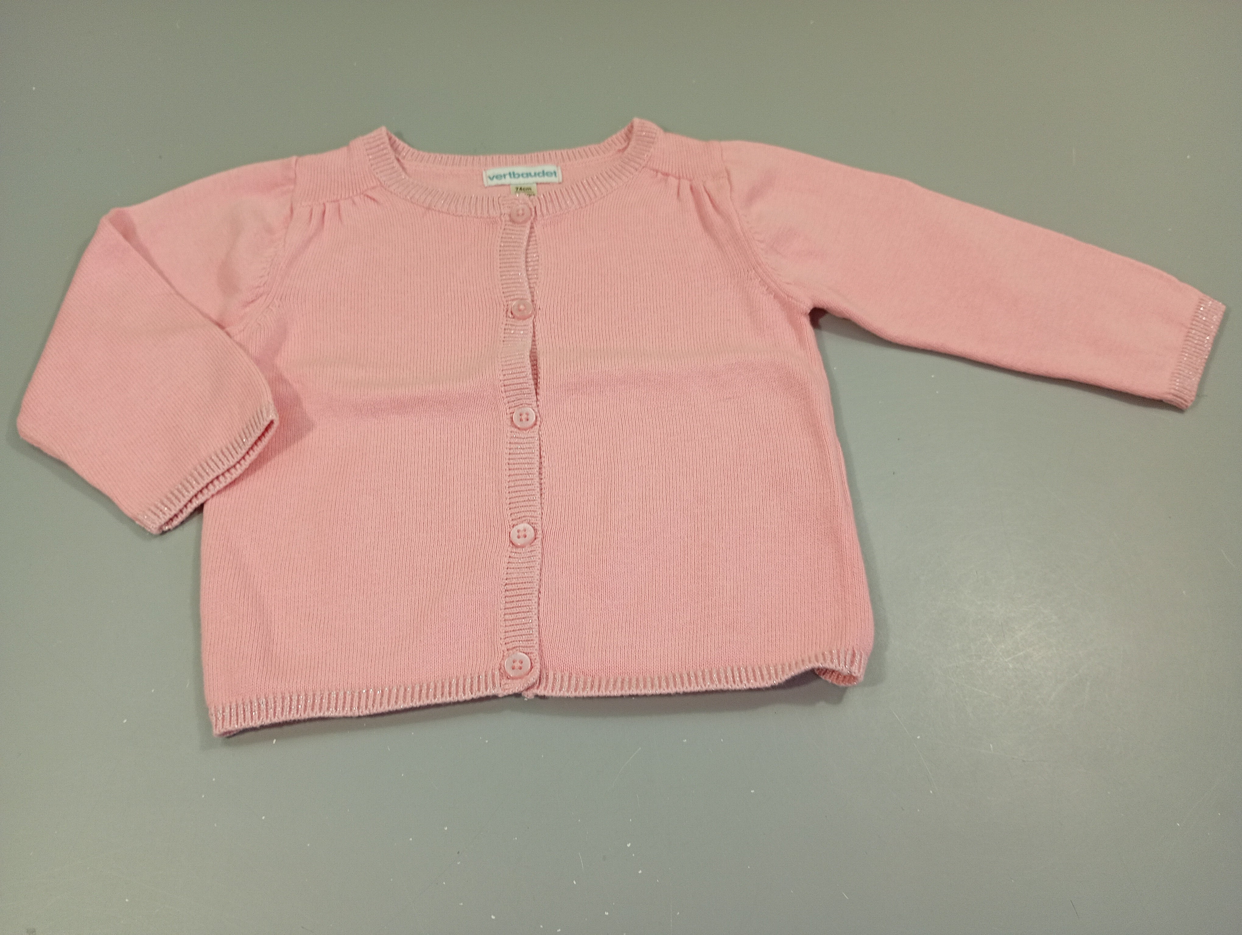 Gilet rose clair , liseré pailleté