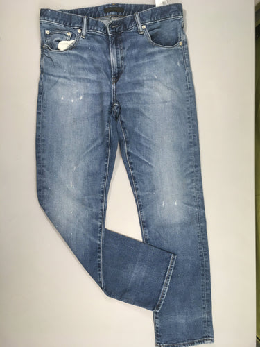 Jeans droit effet éraillé uniqlo Légère tache, moins cher chez Petit Kiwi