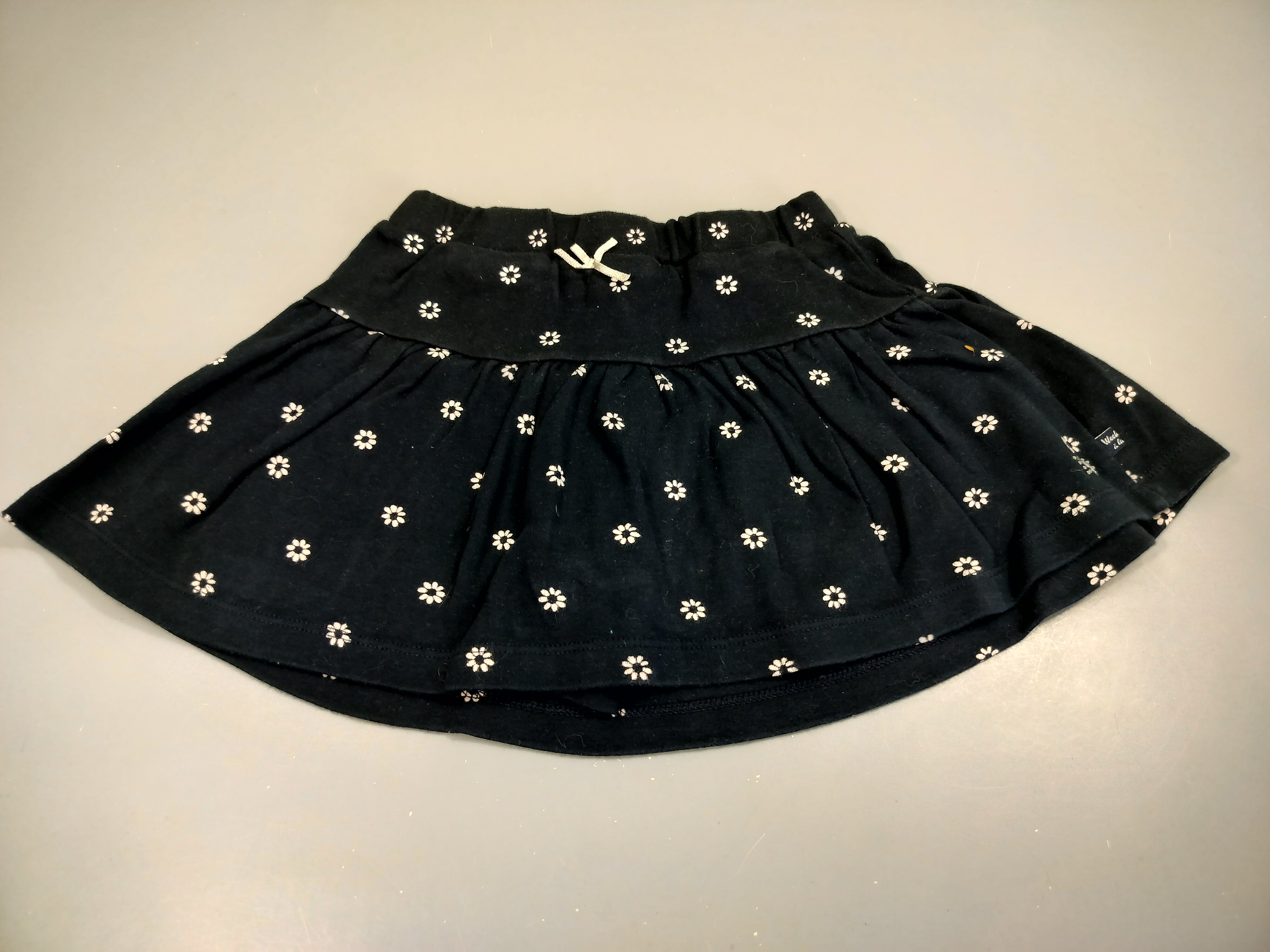 Jupe coton bleu marine à fleurs blanches, doublée