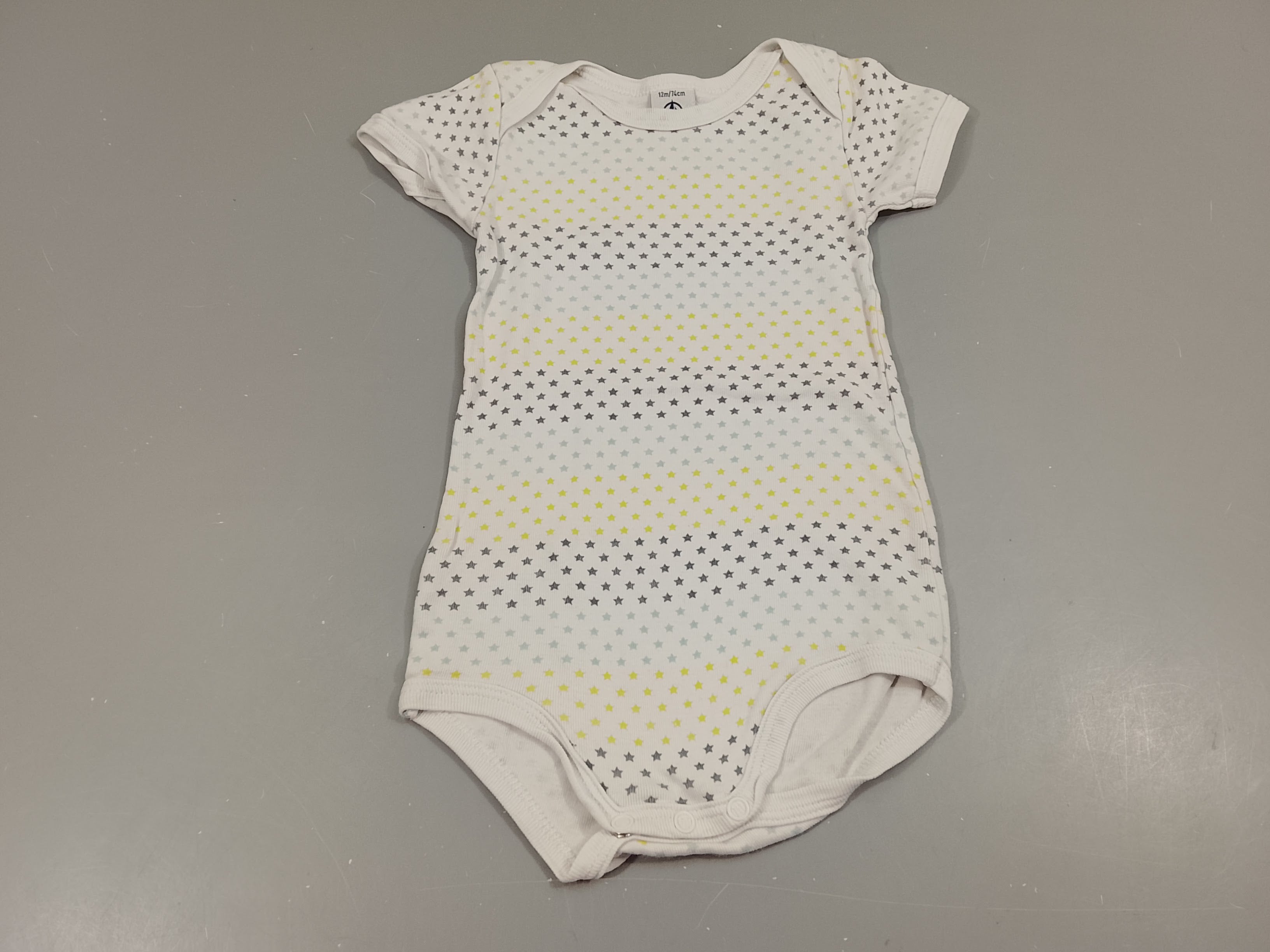 Body m.c blanc, étoiles colorées