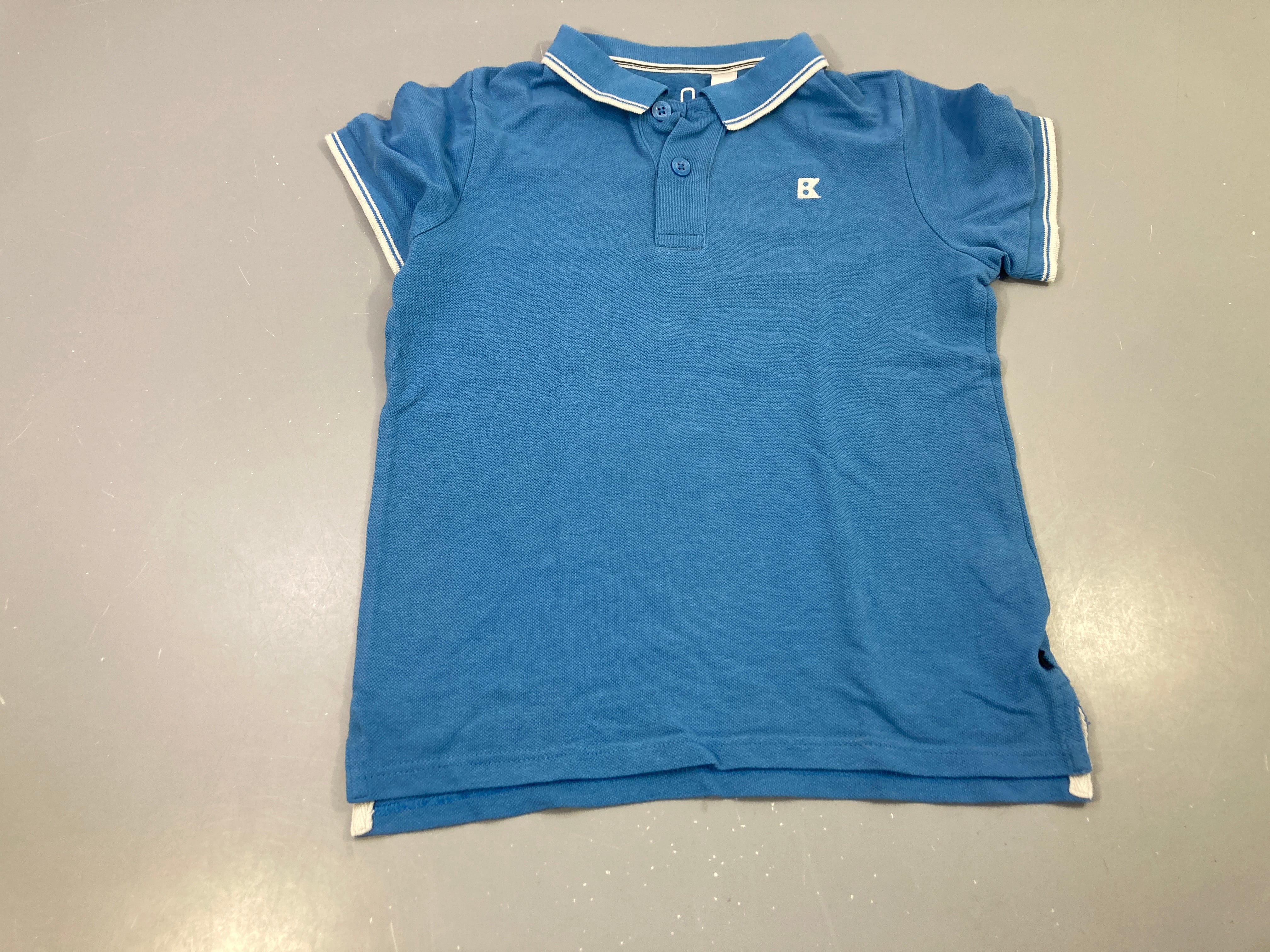 Polo m.c bleu liseré blanc logo B