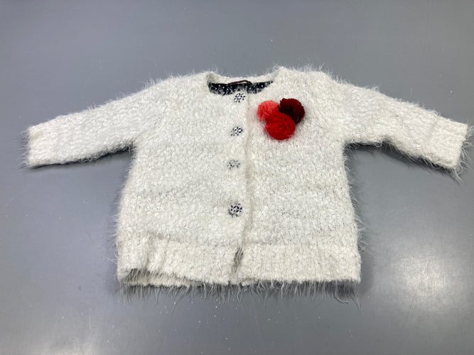 Gilet duveteux écru, pompons rouge et rose, moins cher chez Petit Kiwi