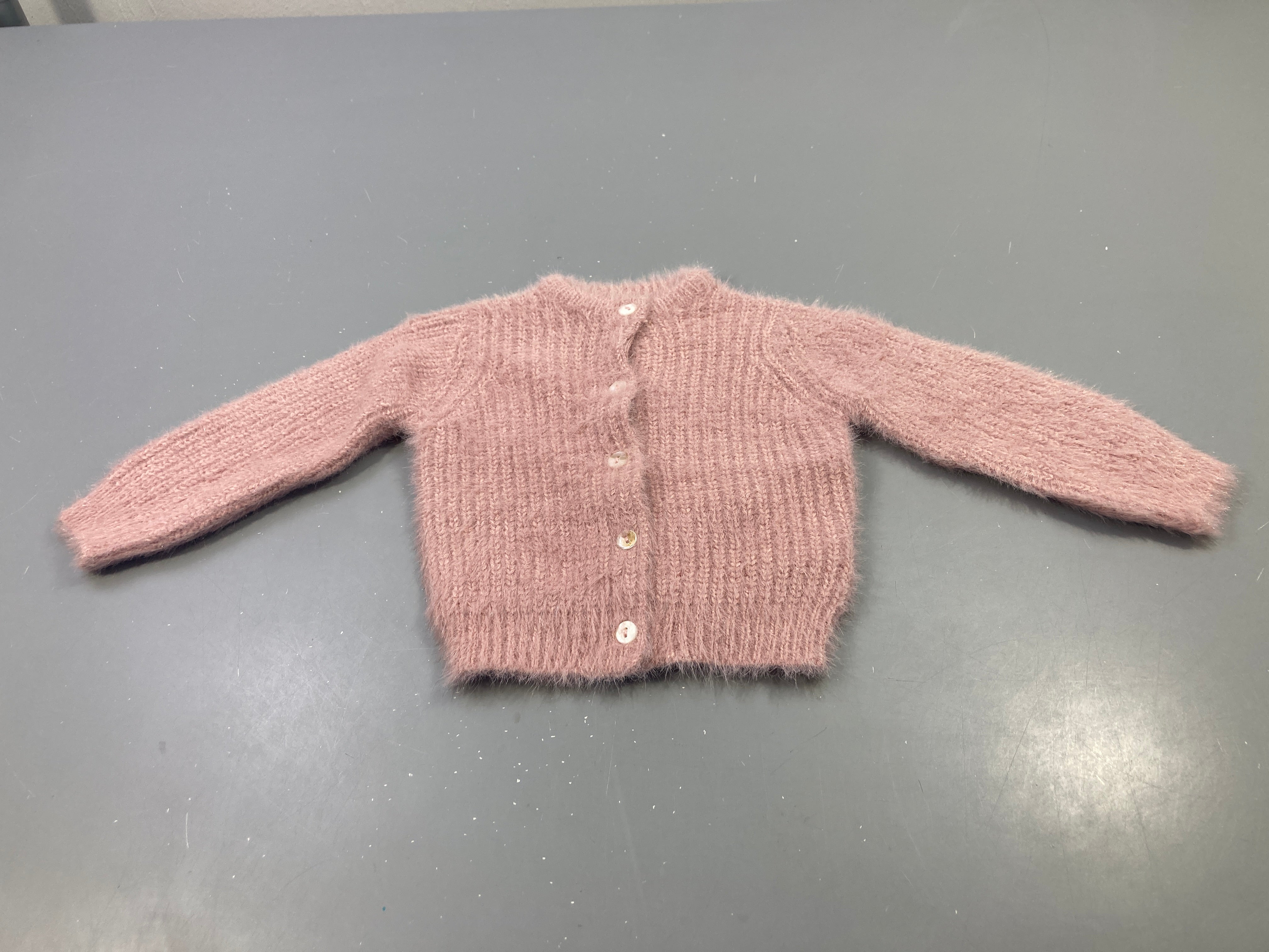 Gilet duveteux rose