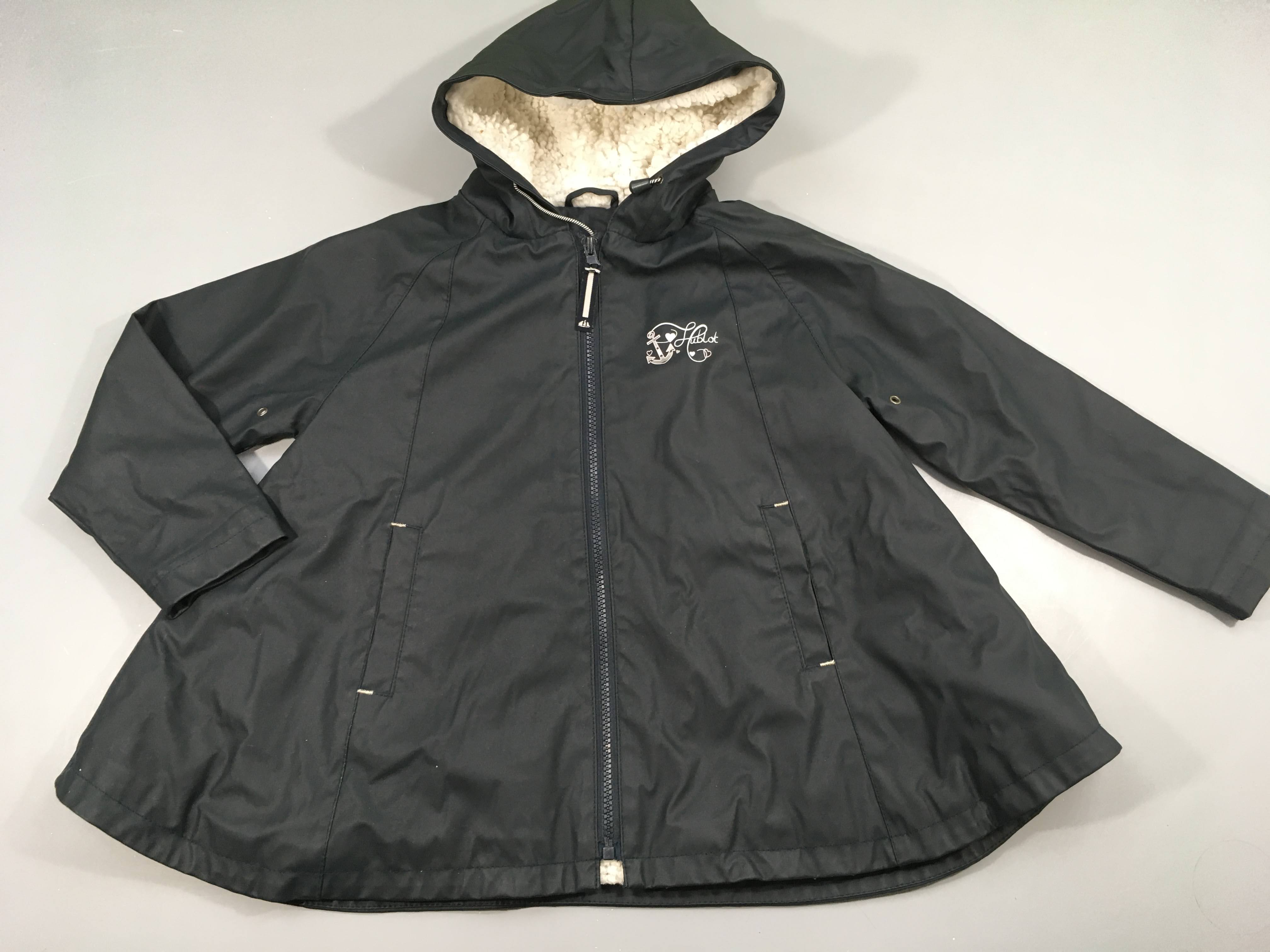 Veste cirée zippée bleu marine à capuche Hublot, doublé peluche, matière légèrement 
