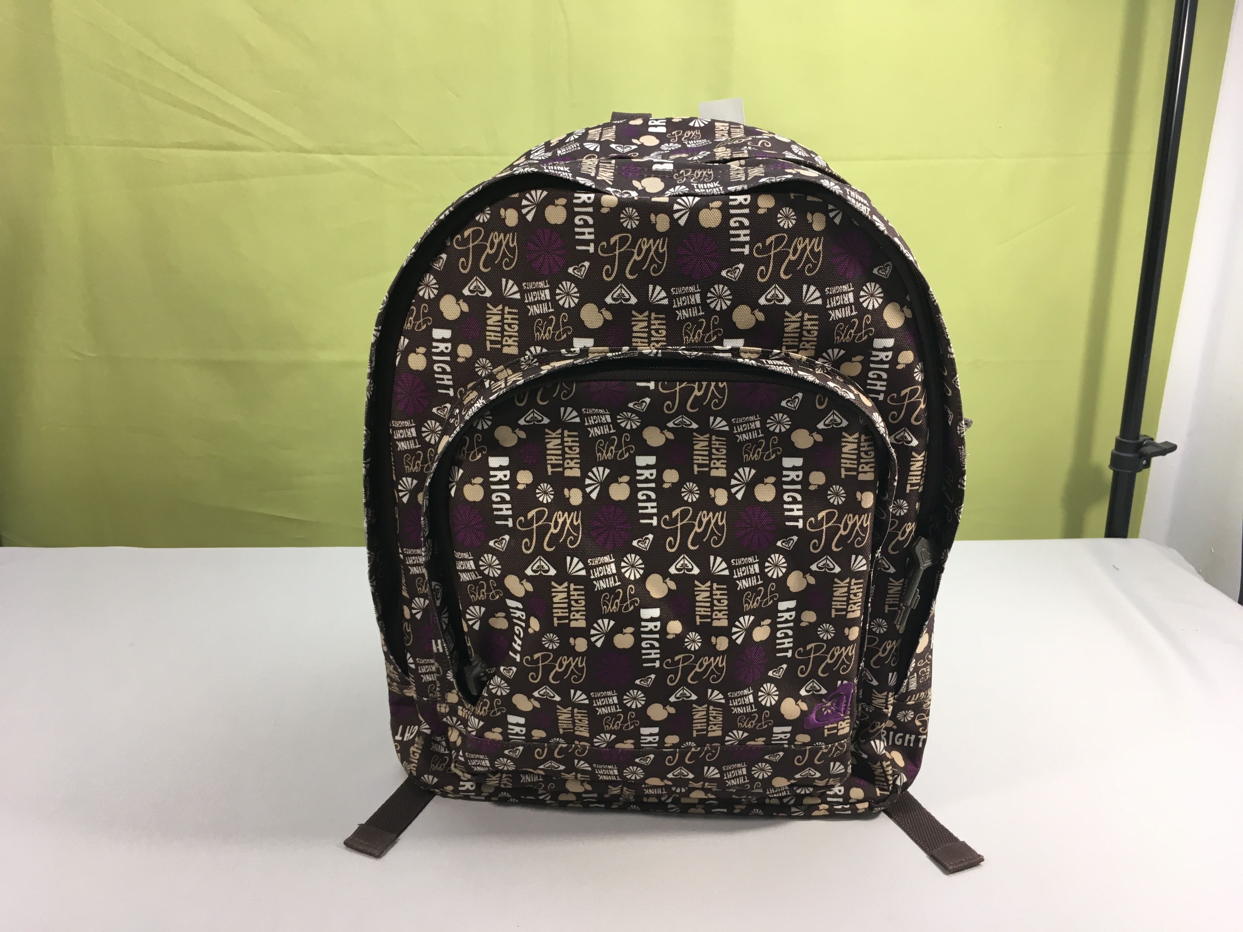 Sac à dos brun-écriture mauve en parfait état