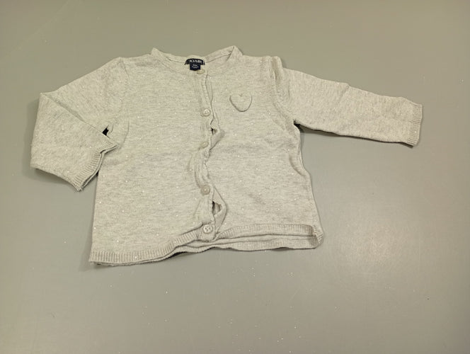 Gilet fin gris clair chiné à pois blanc, coeur en relief.  Très légèrement bouloché., moins cher chez Petit Kiwi