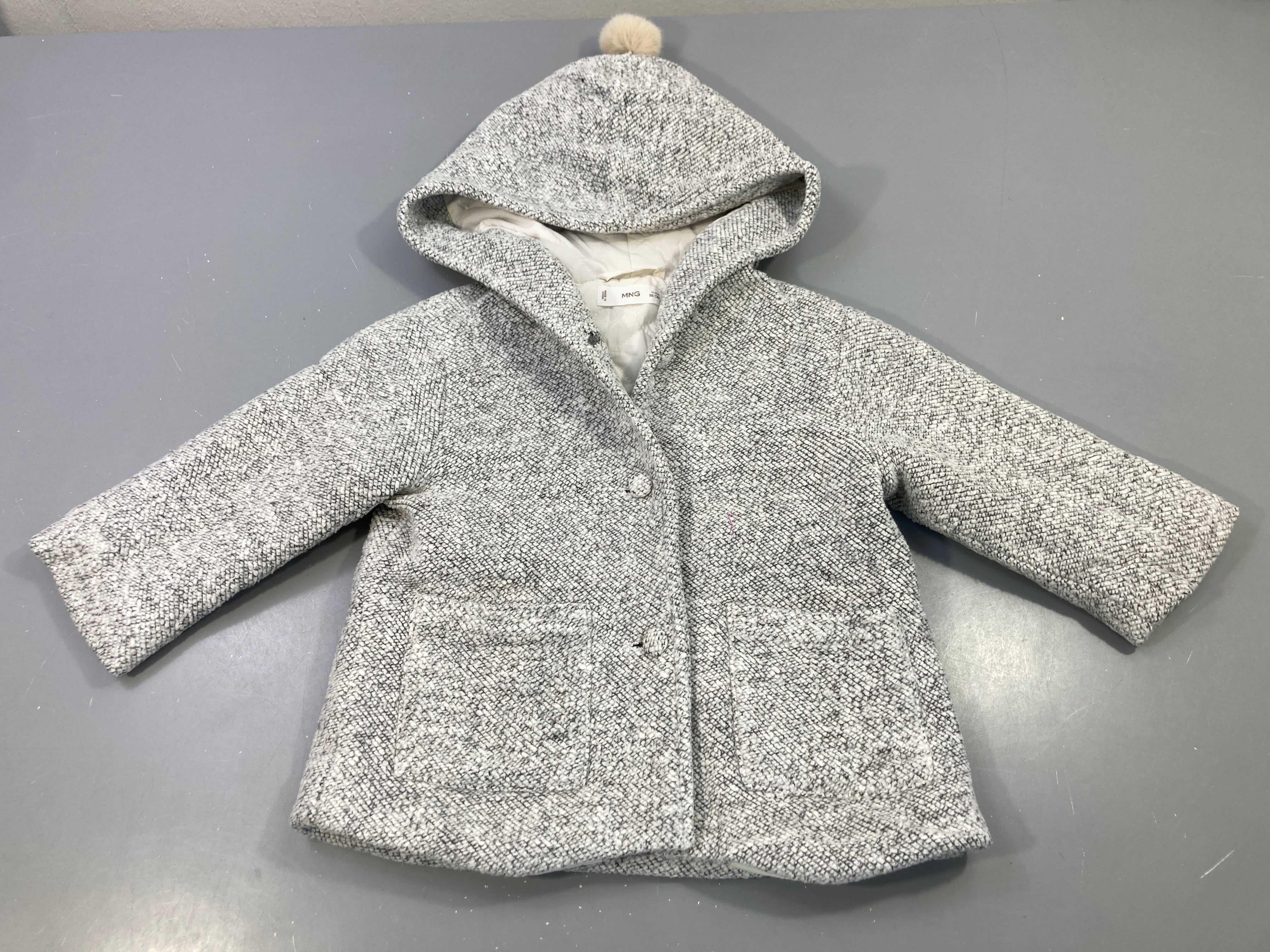 Manteau capuche gris chiné pompon