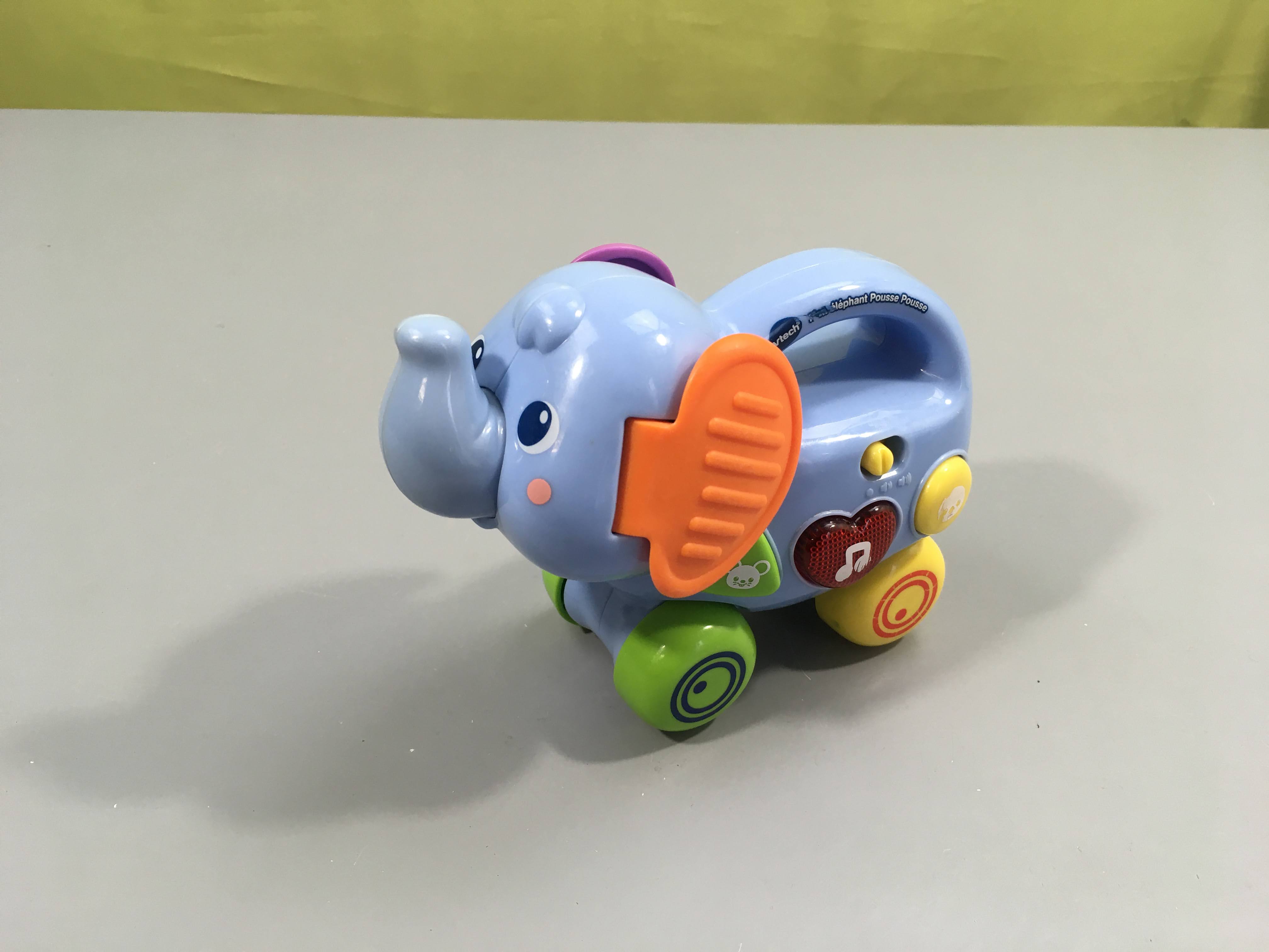Mon élépant pousse pousse-Fonctionne-Quelque traces d'usure 6-36m