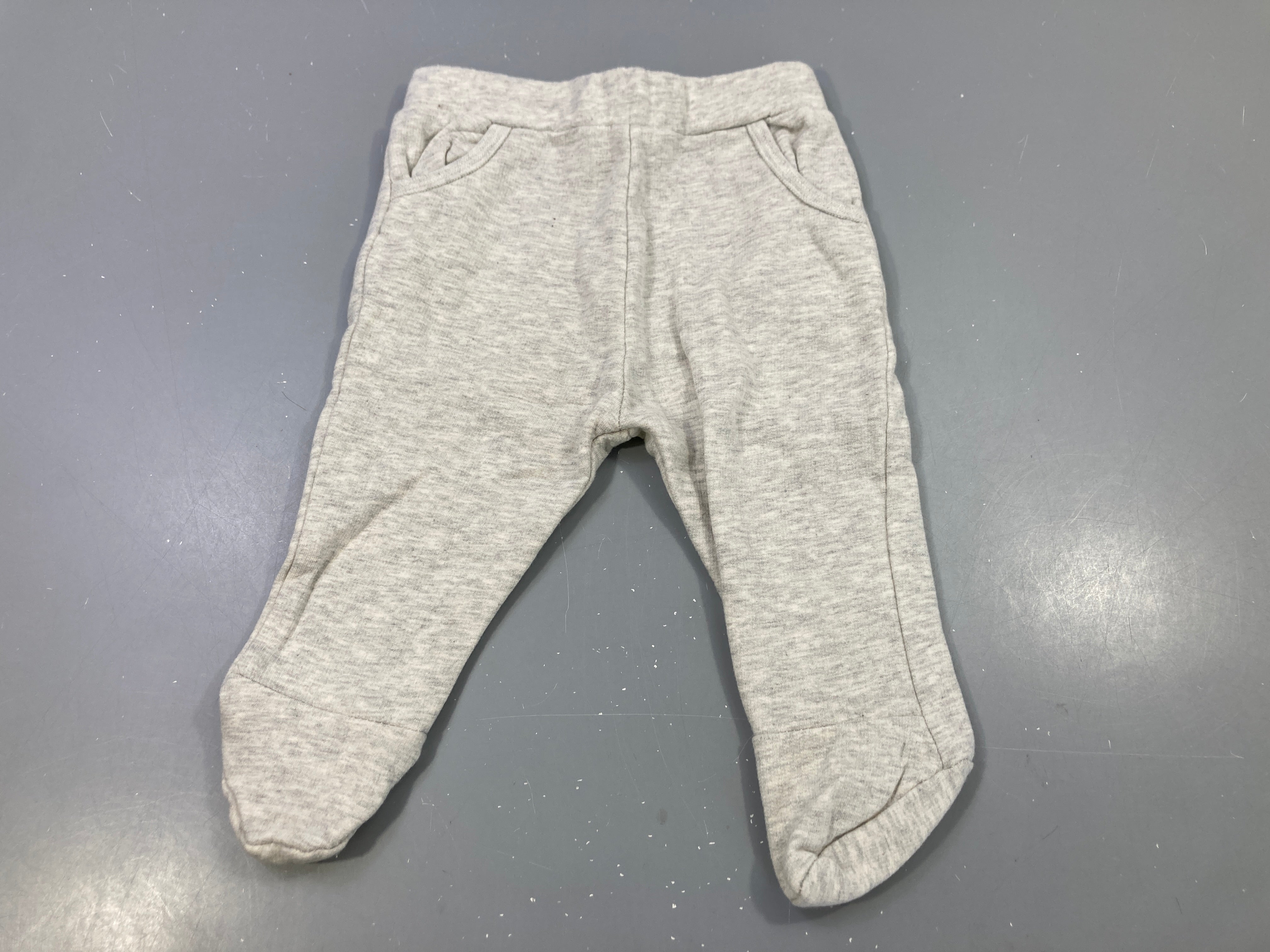 Pantalon gris chiné, poches obliques, pieds