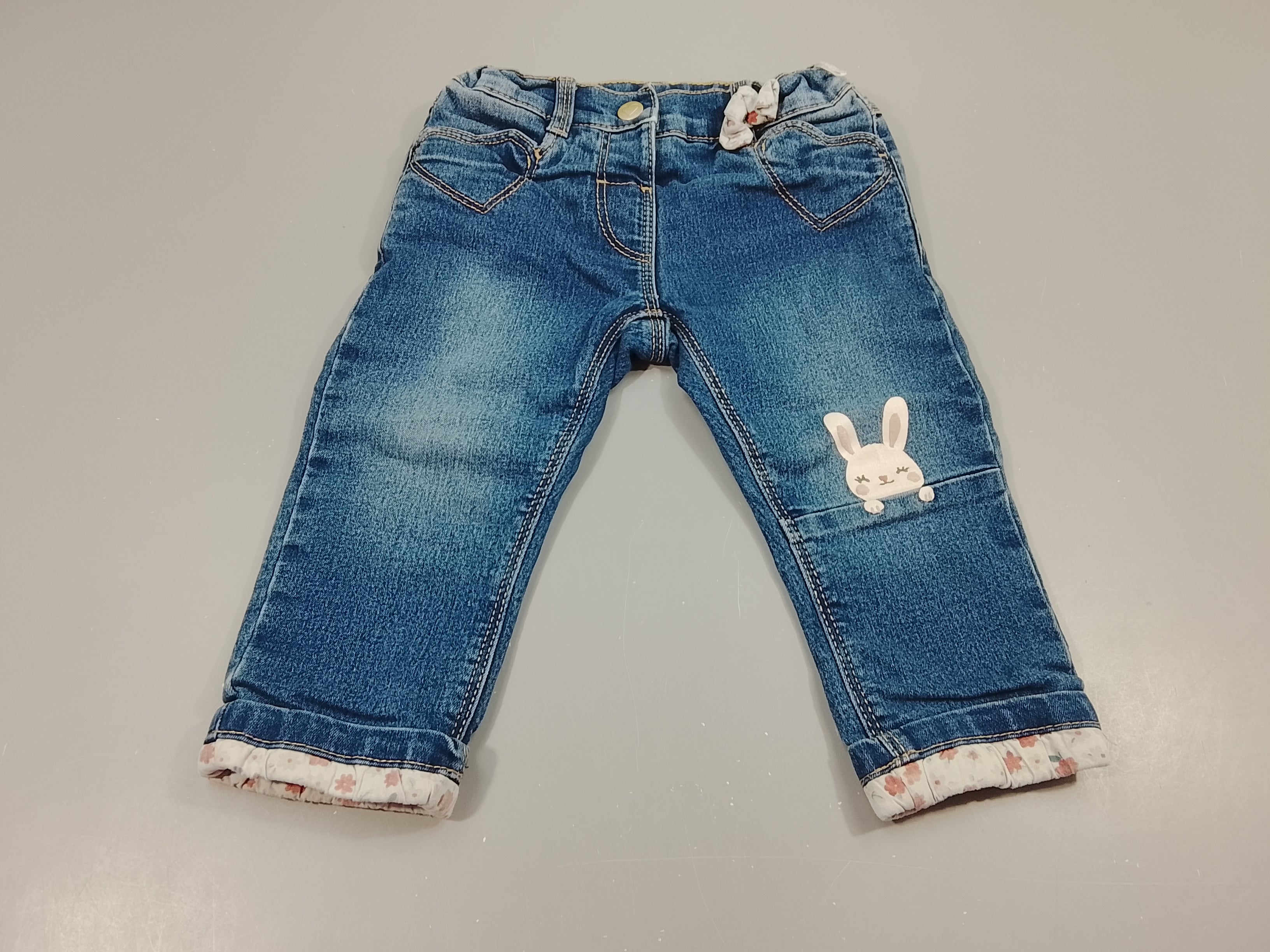 Jeans à revers doublé jersey , tête de lapin , poches coeurs