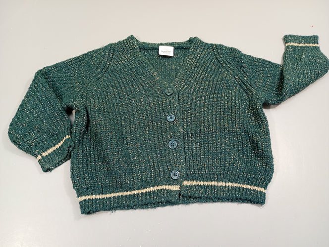 Gilet  tricot vert, fils dorés. Col V. Légèrement bouloché., moins cher chez Petit Kiwi