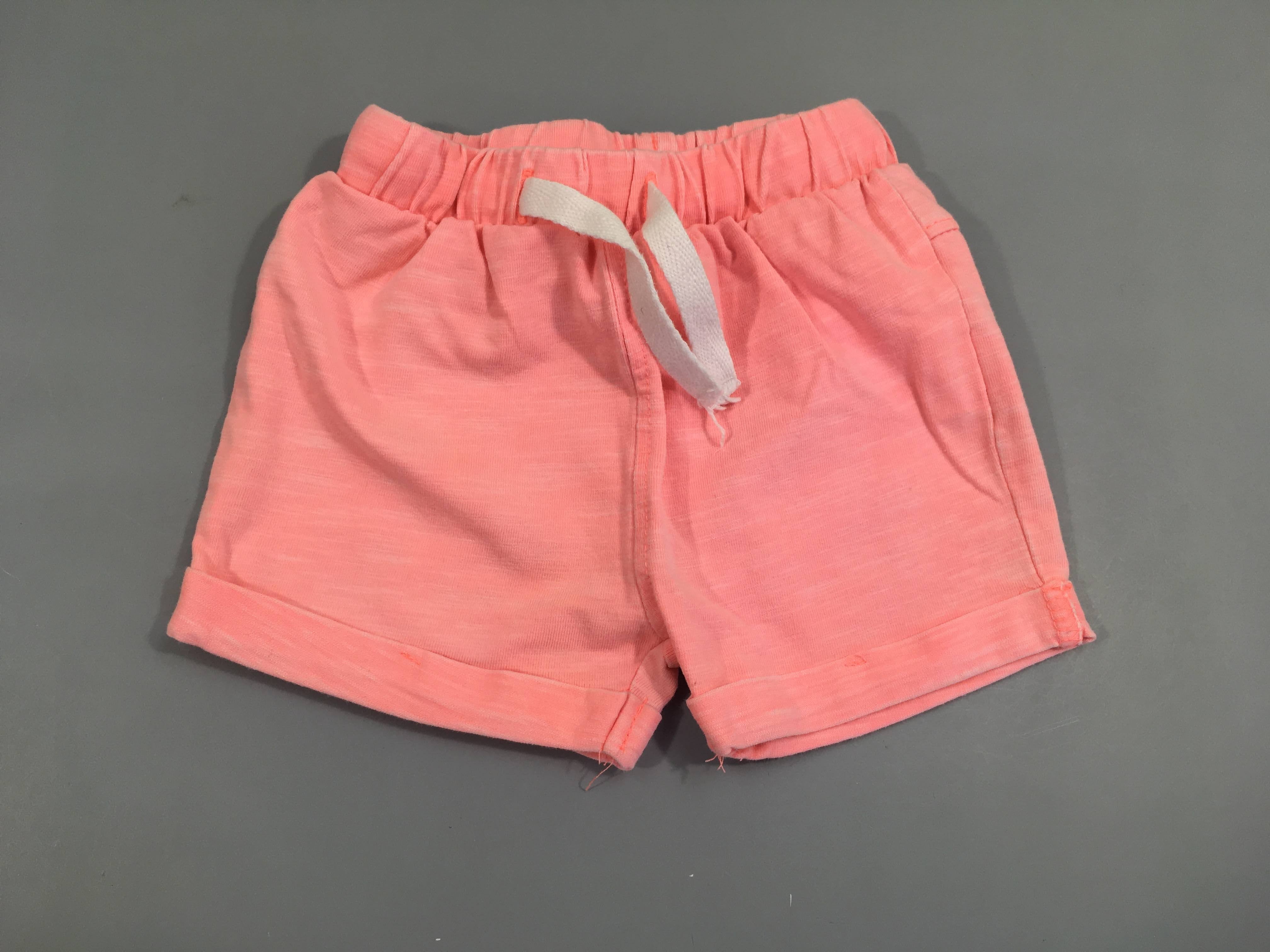 Short jersey rose néon flammé, petite tache