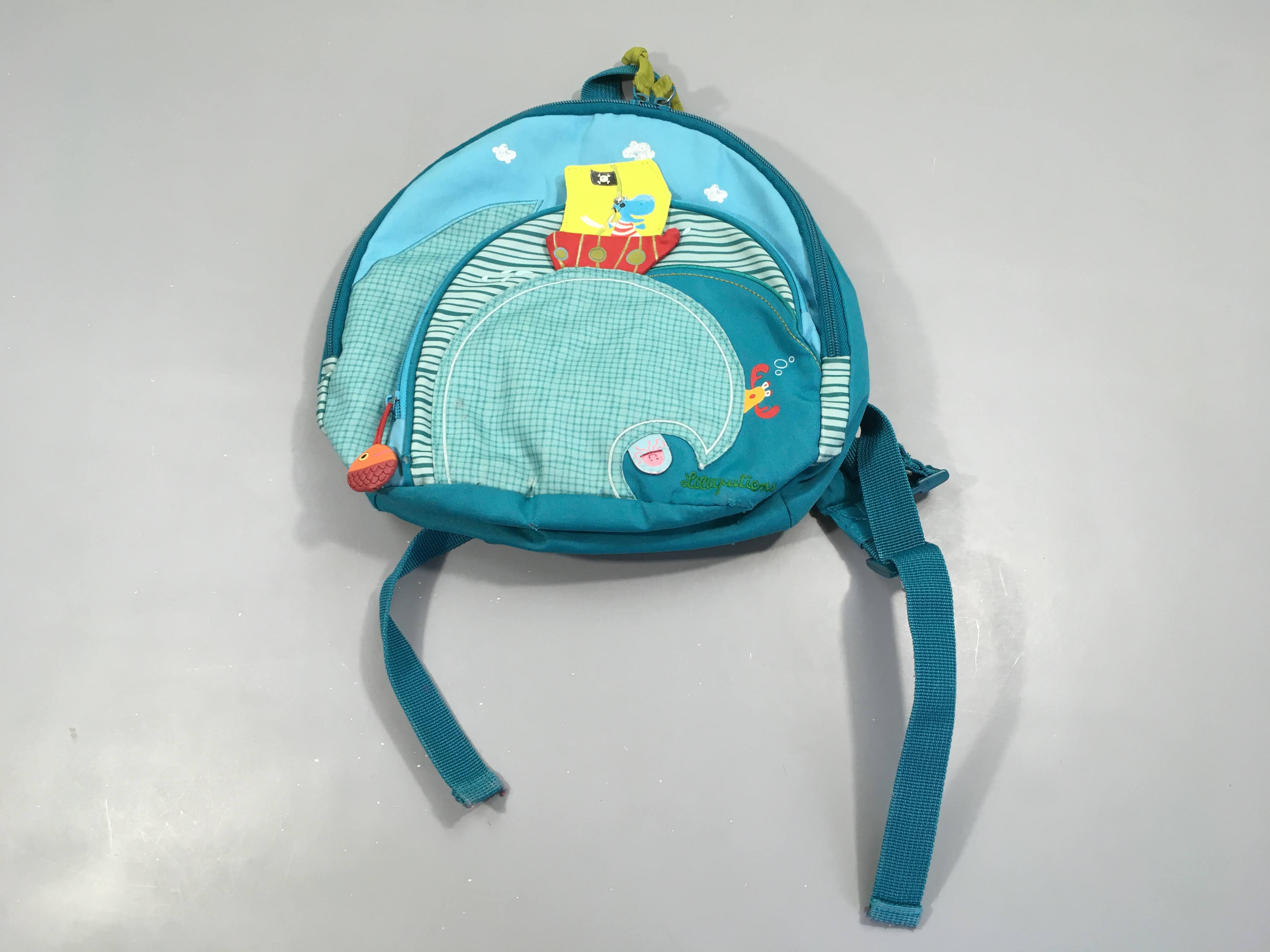 Sac à dos rond Arnold, bas usé