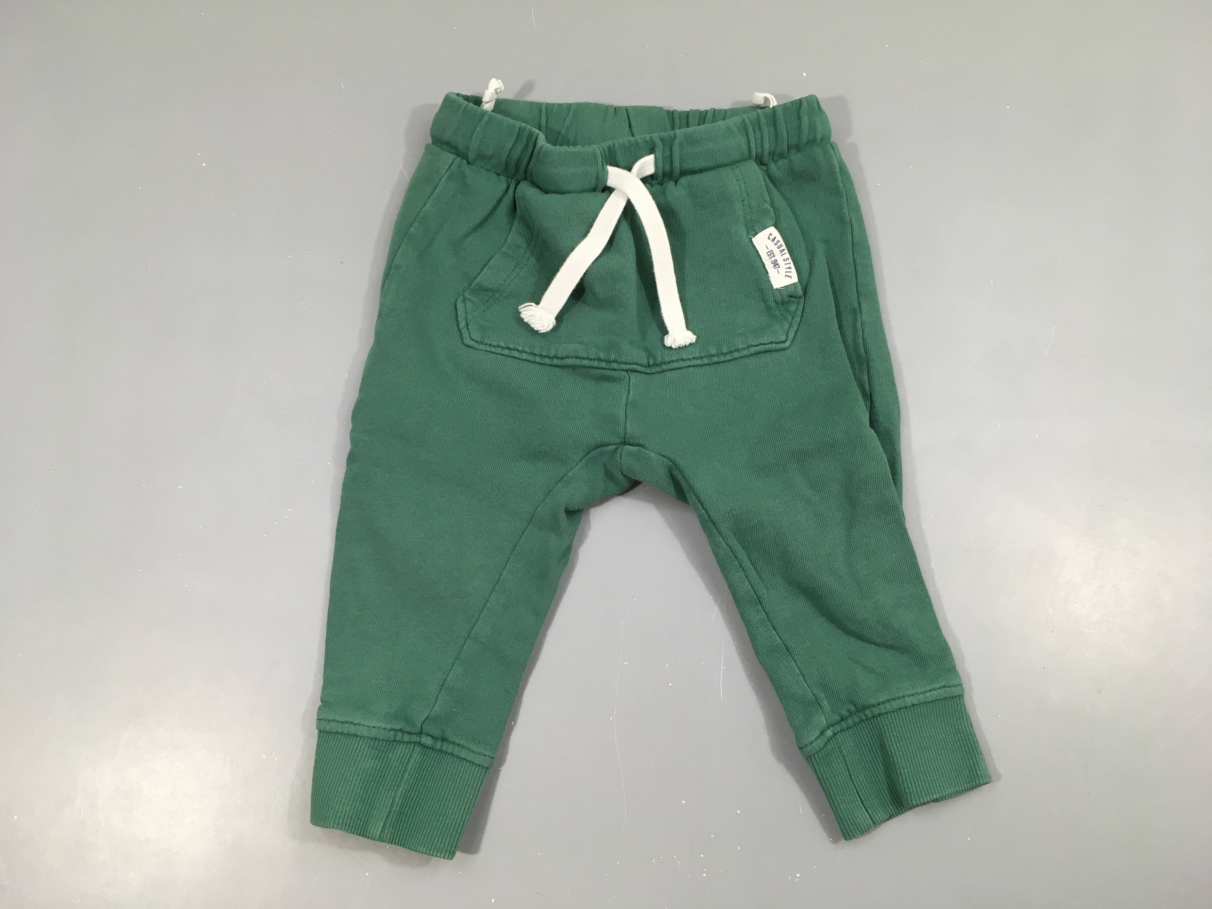 Pantalon molleton vert poche avant