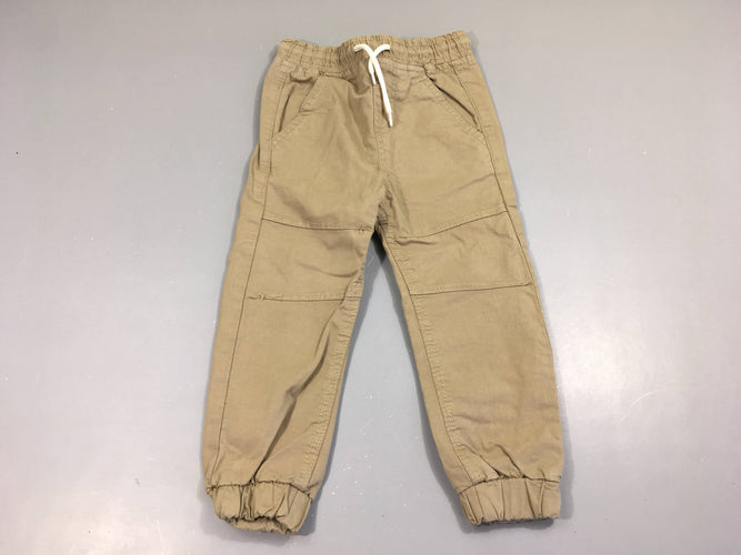 Pantalon taille et chevilles élastiques beige, moins cher chez Petit Kiwi