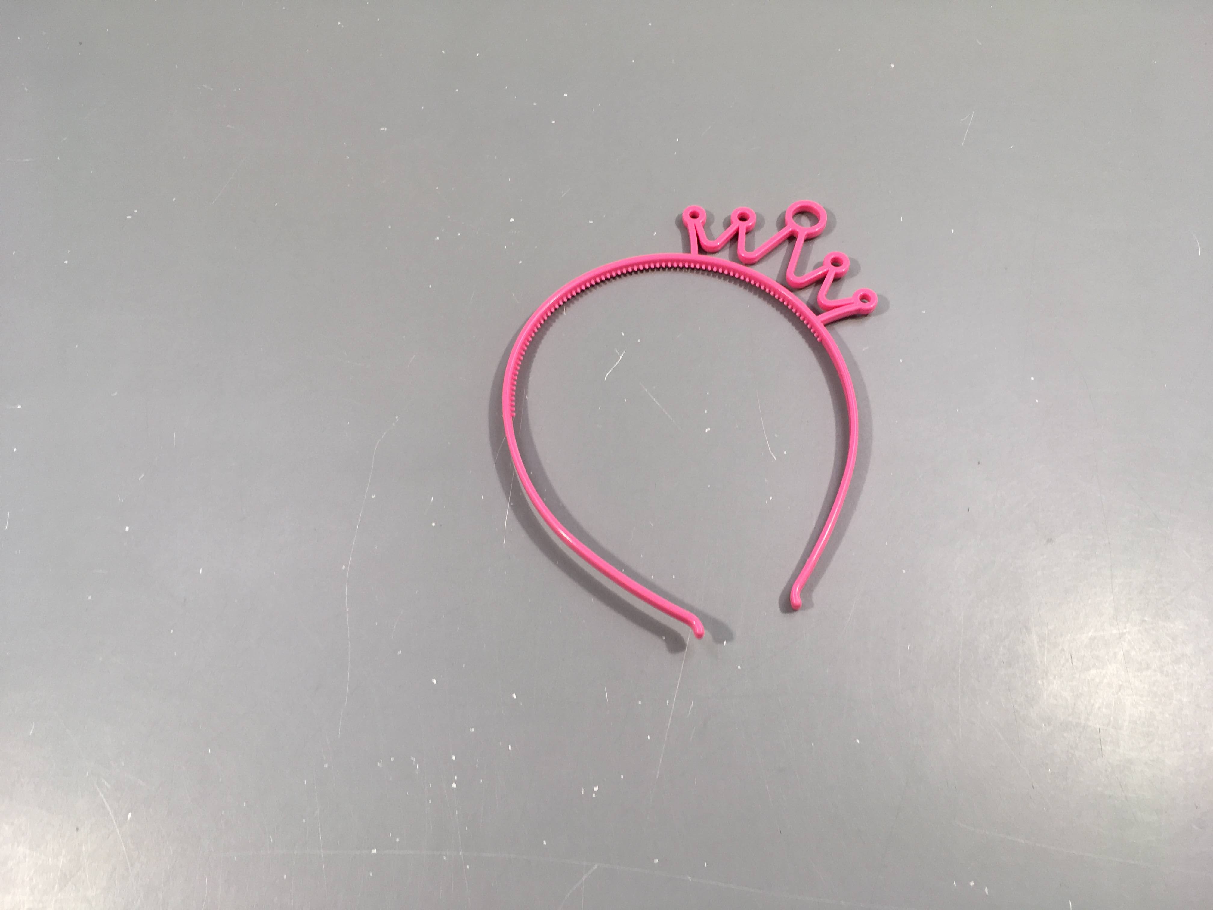 Déguisement serre-tête plastisque rose couronne