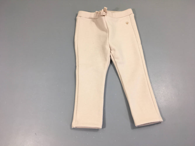 Pantalon molleton rose irisé, un peu bouloché, moins cher chez Petit Kiwi