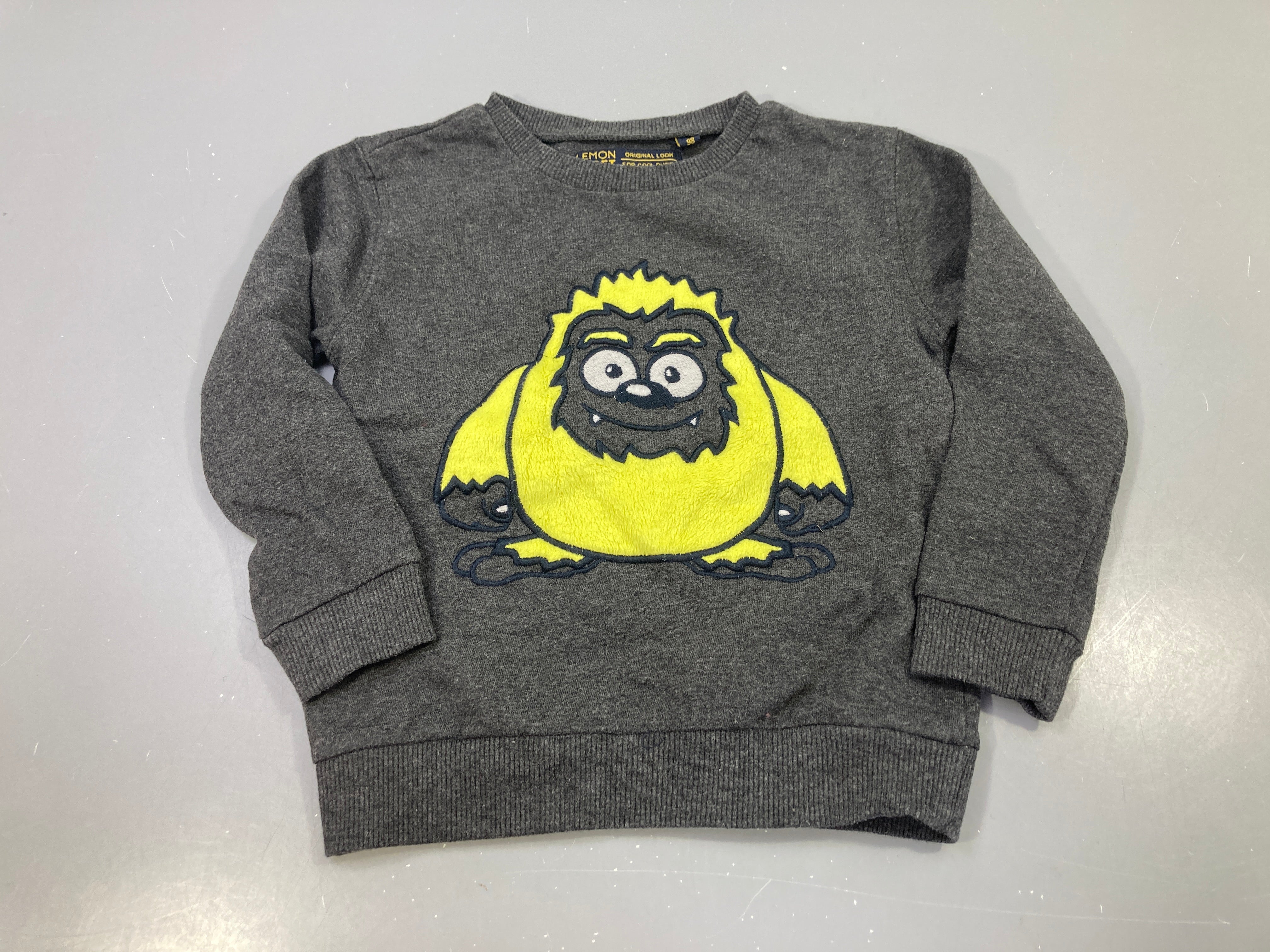 Sweat gris chiné, monstre jaune-noir brodé effet velours, Lemon