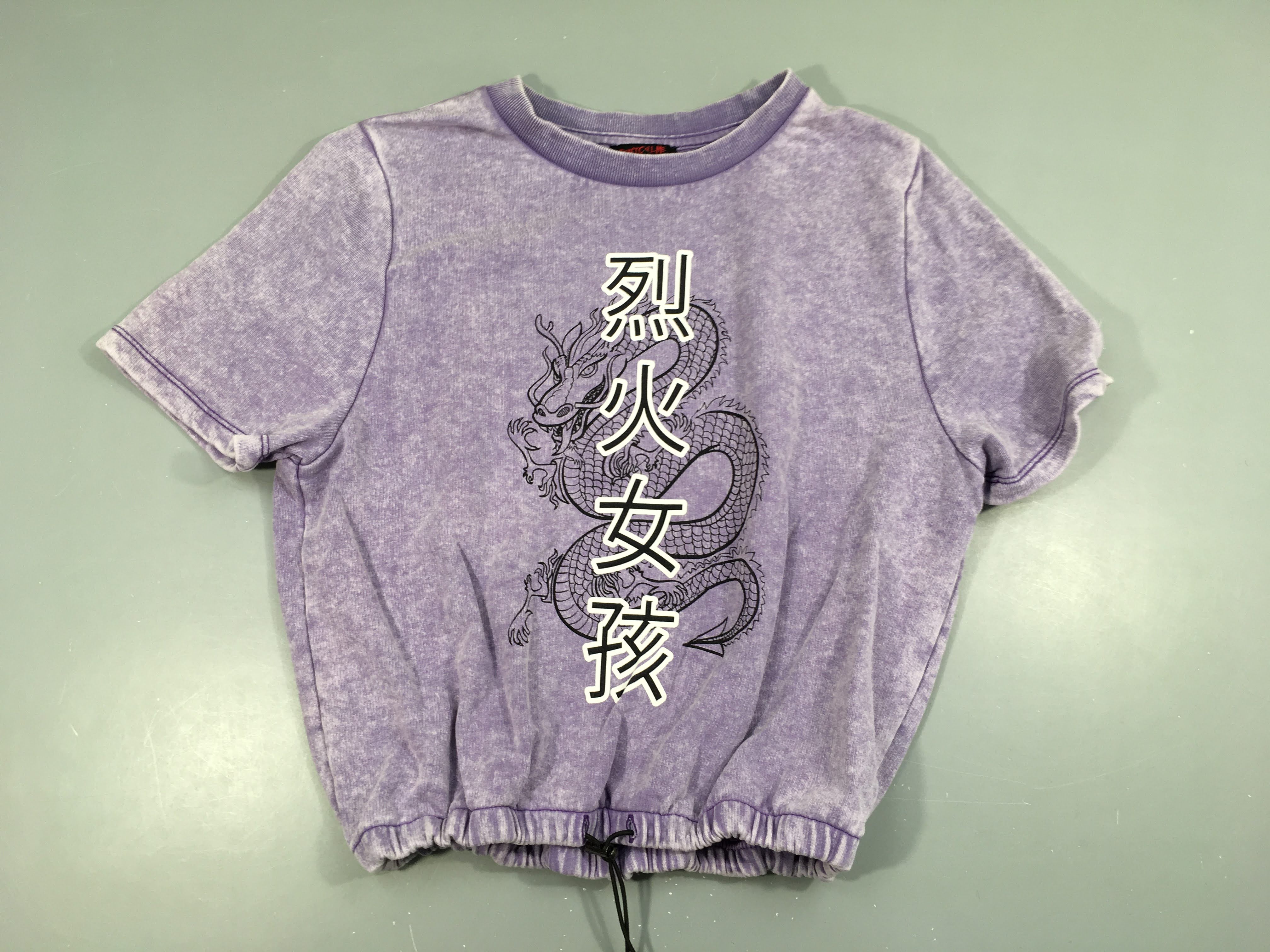 Sweat m.c mauve effet délavé dragon
