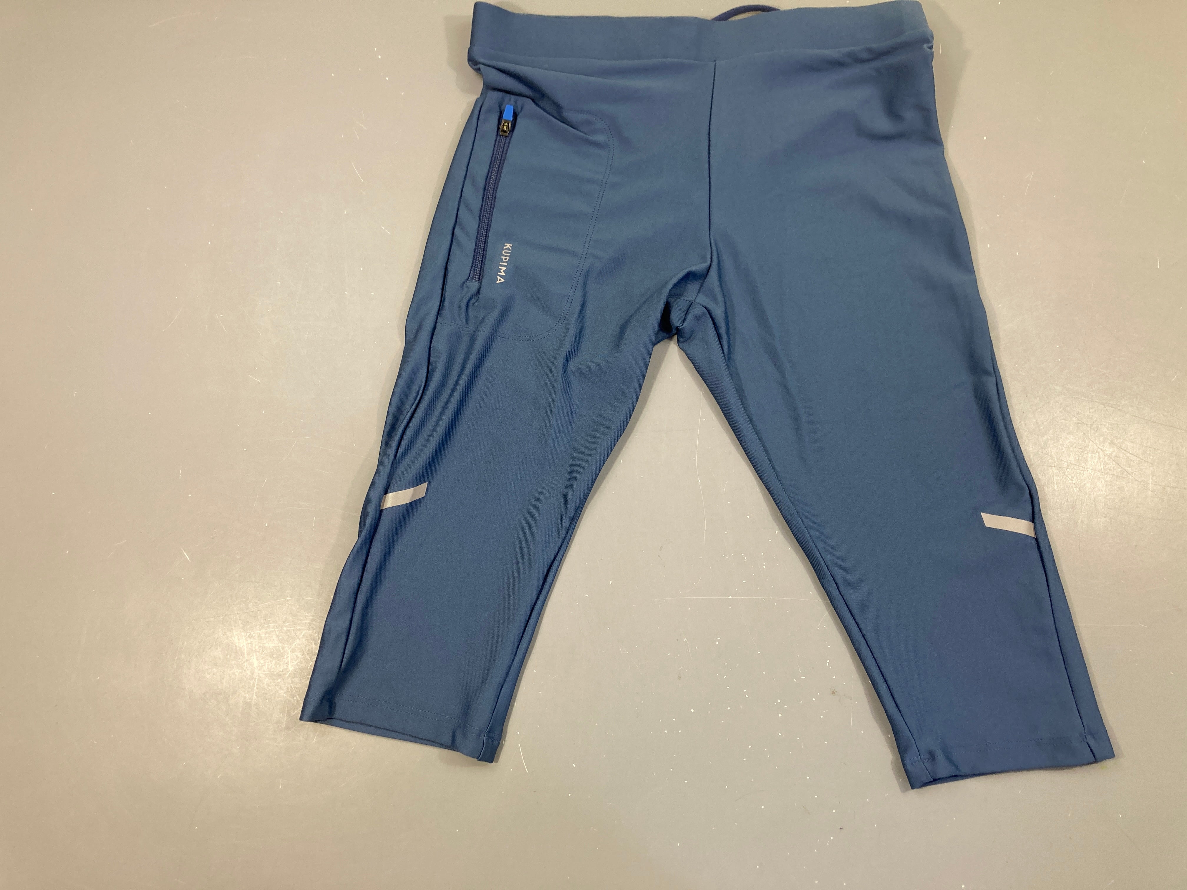 Cycliste de course Kip Run bleu