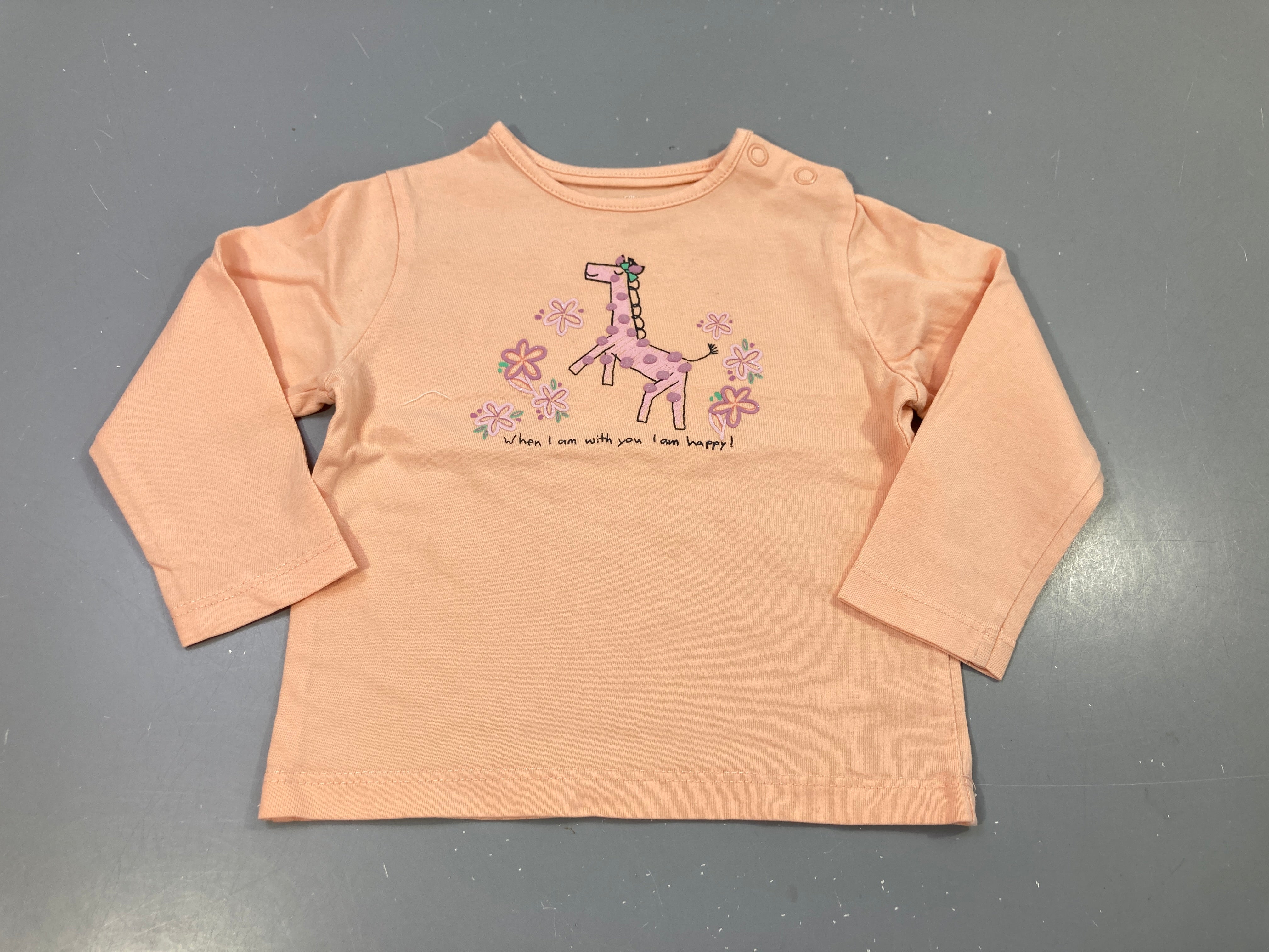 T-shirt m.l  orange clair, girafe et fleurs