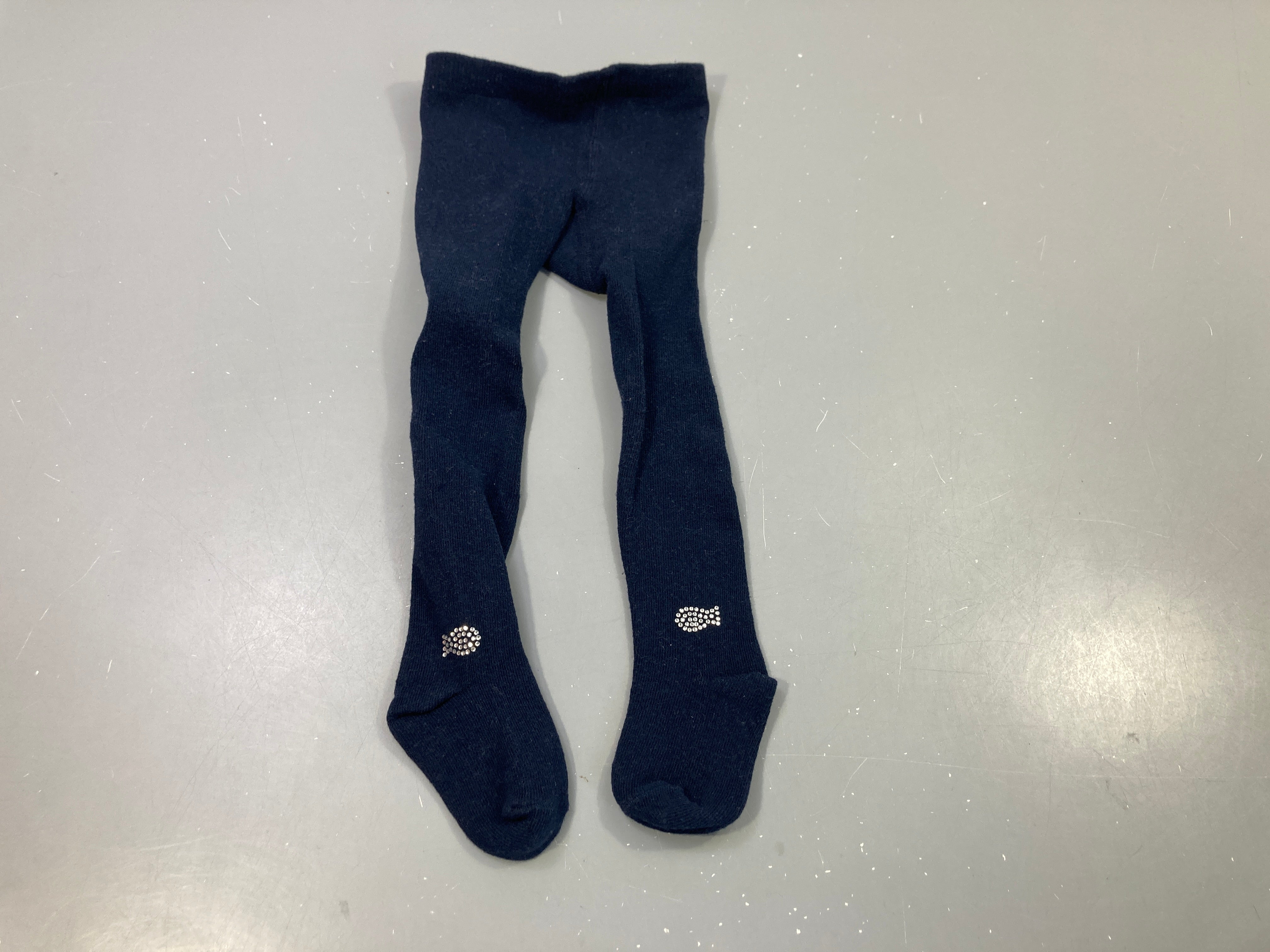 Collants bleu marine, poissons en strass. Pas de taille indiquée, estimée 12m