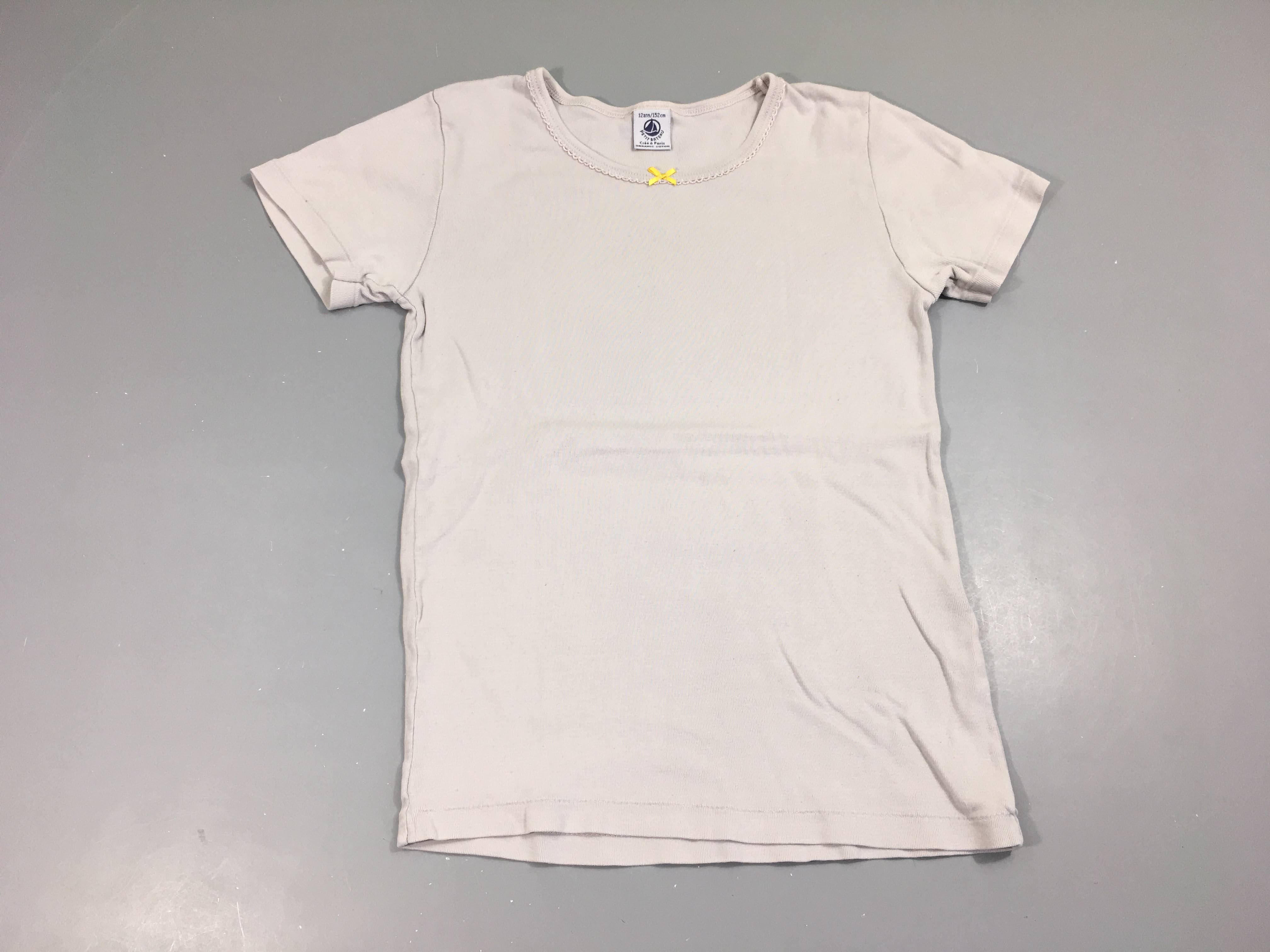 Chemisette m.c bleu clair noeud jaune