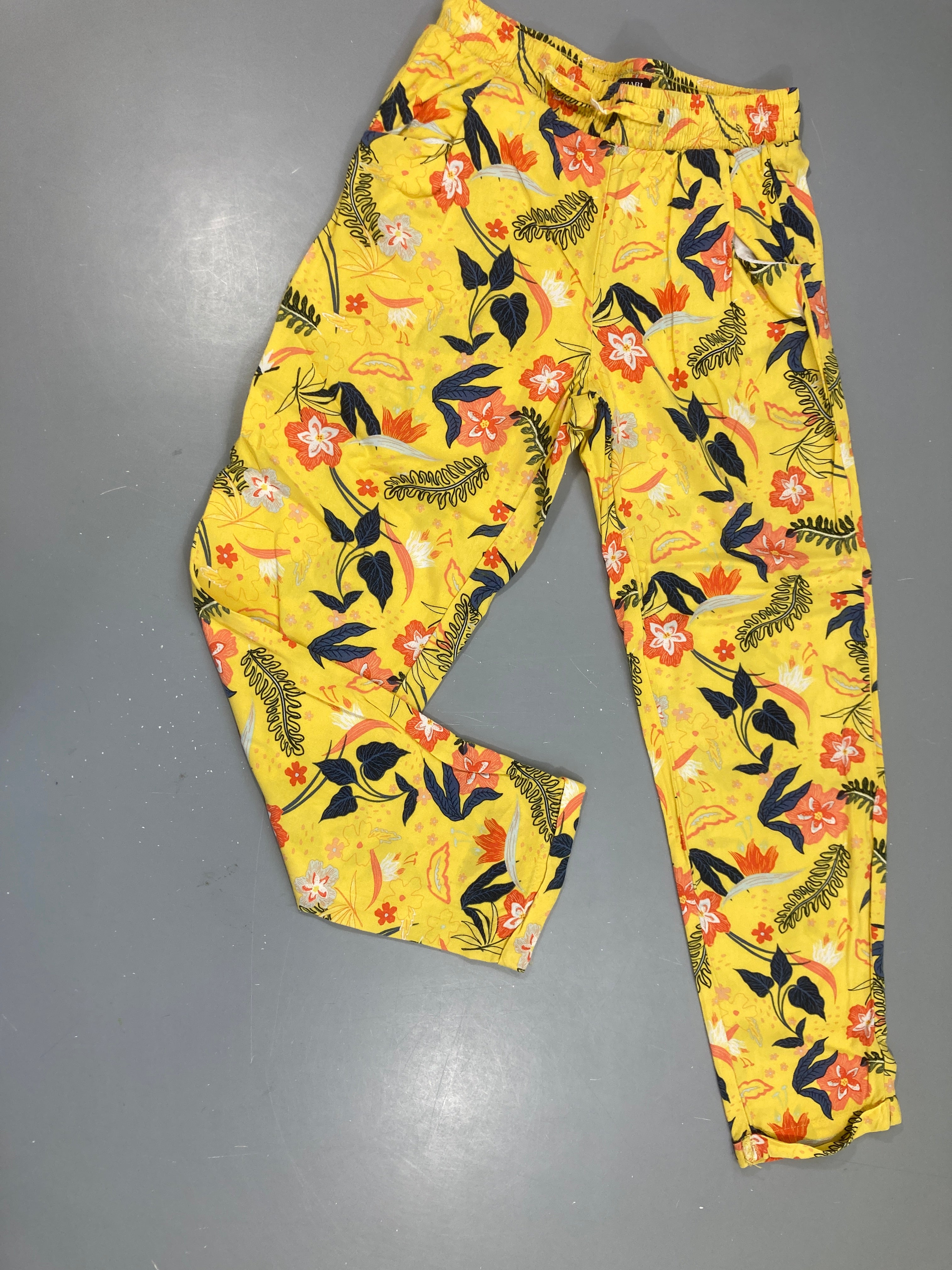 Pantalon fluide jaune fleuri