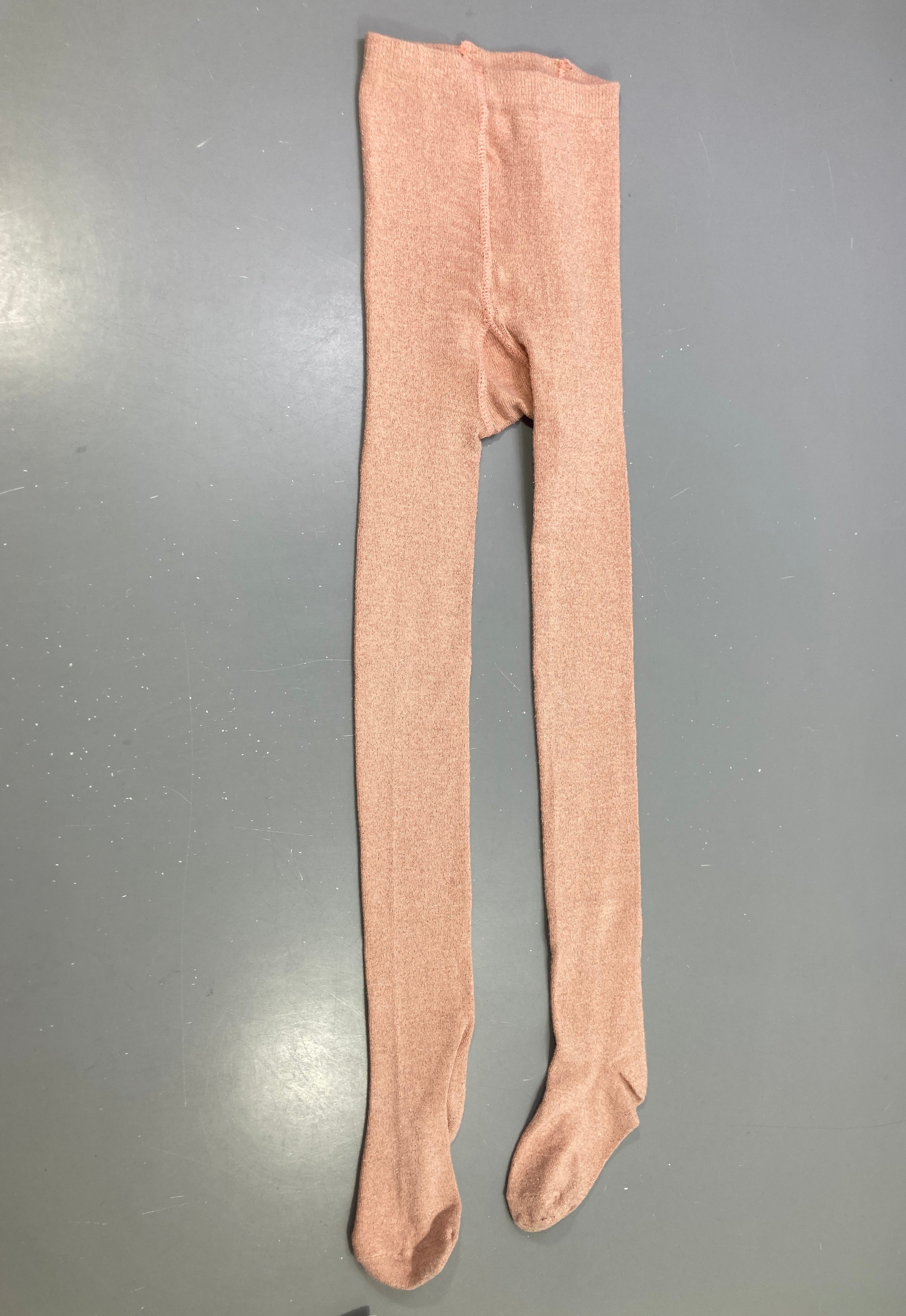 Collant rose pâle irisé