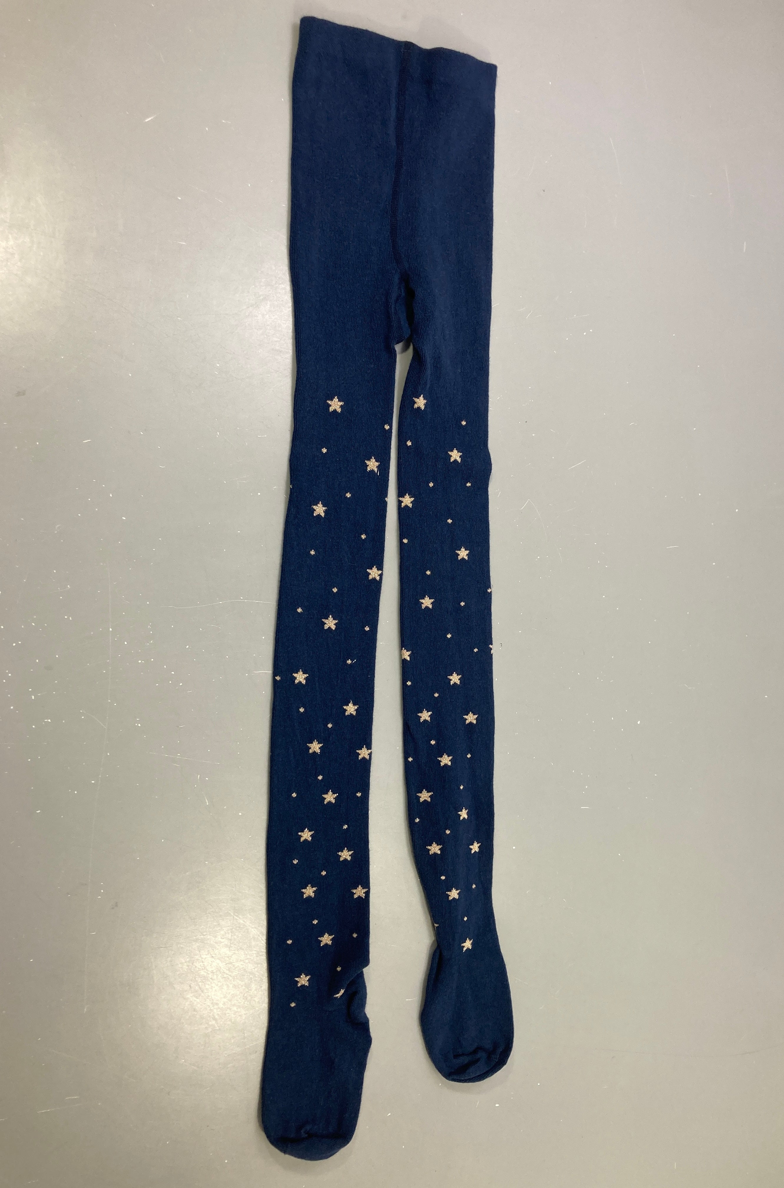 Collant bleu marine étoiles dorées