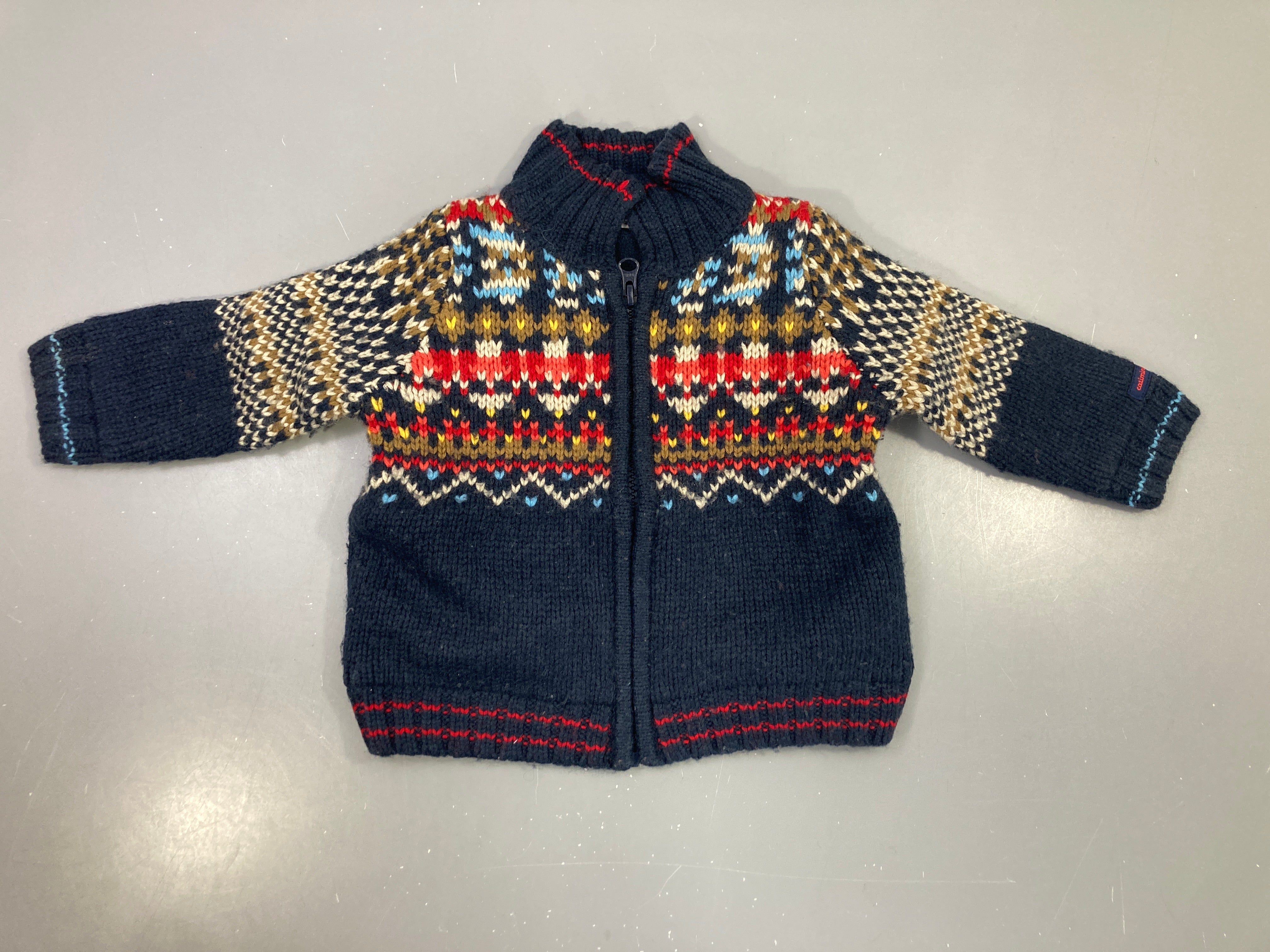 Gilet zippé marine jacquard multicolore, 20% laine doublé polar, un peu bouloché