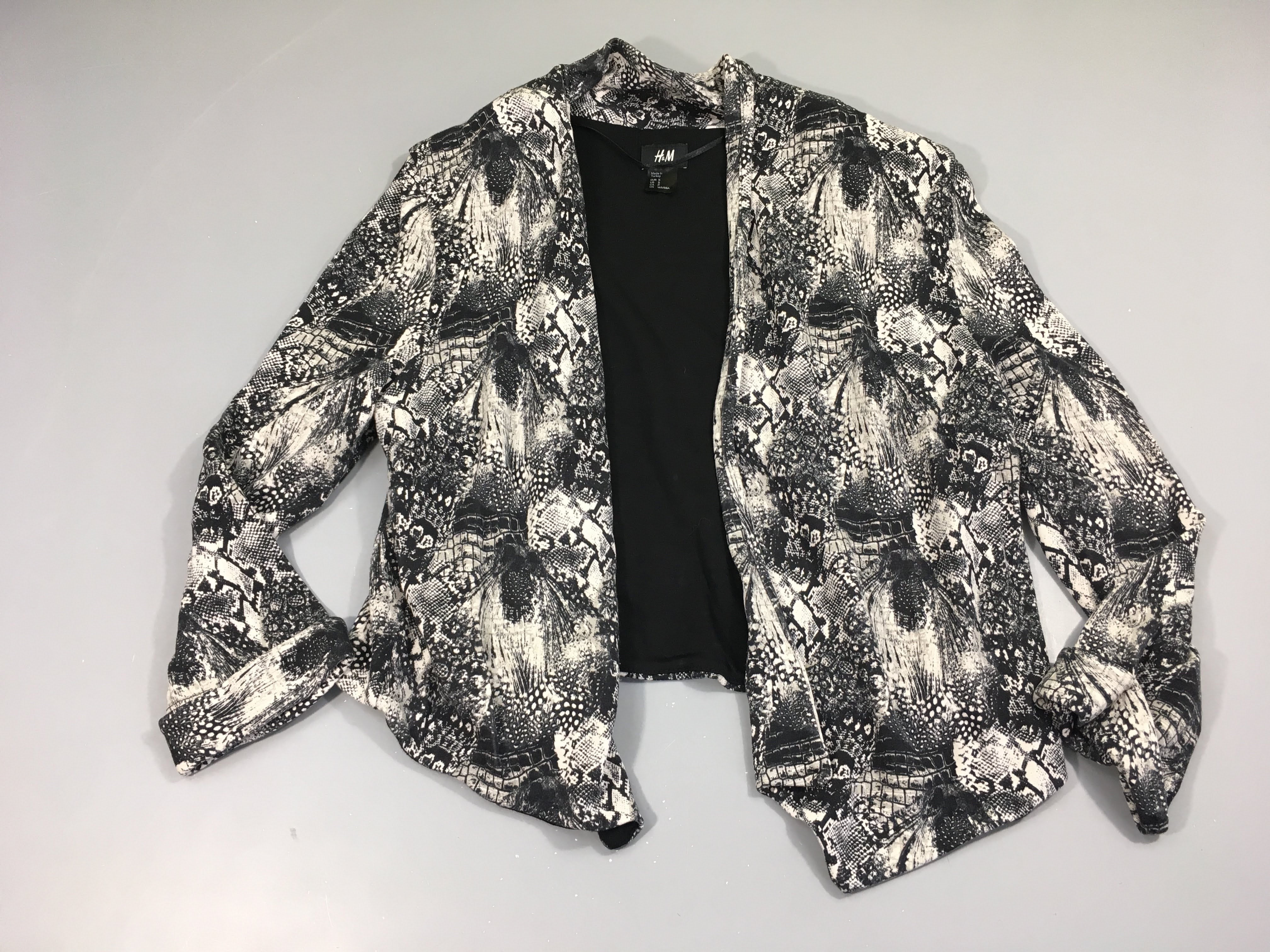 Gilet noir épaulettes effets beiges