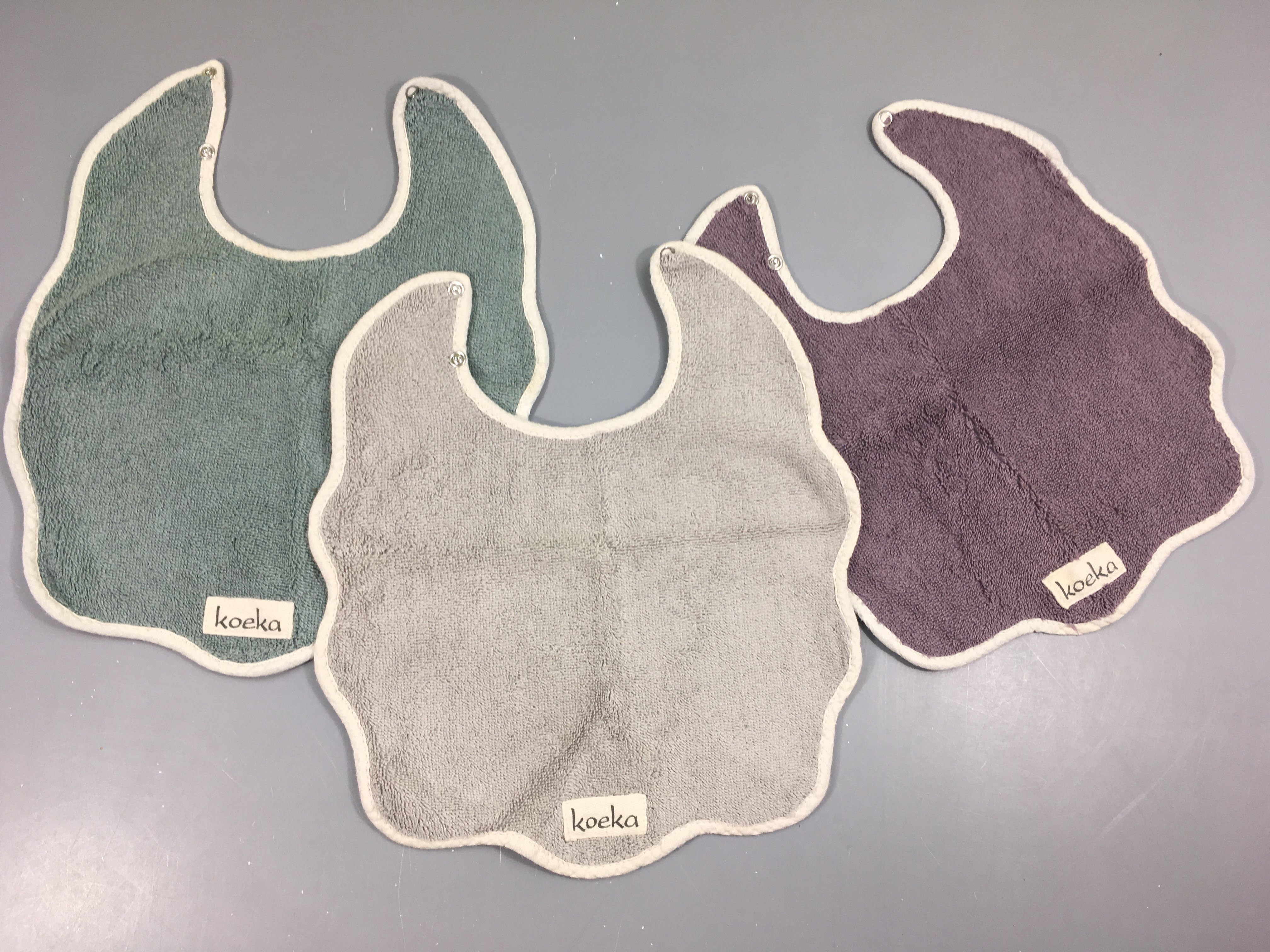 3 Bavoirs Koeka gris-mauve-vert